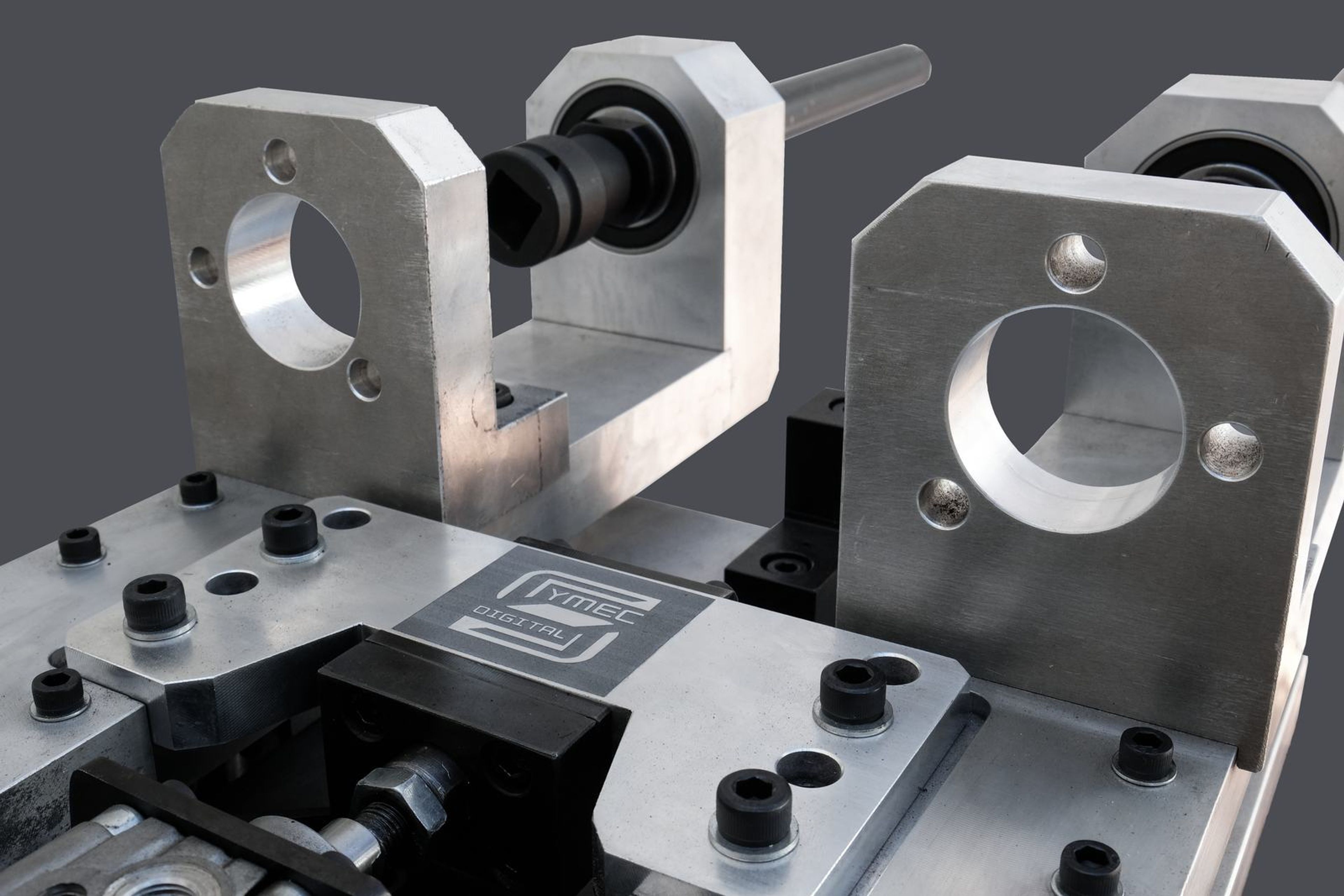 Retouched close view of the clamp and logo plate