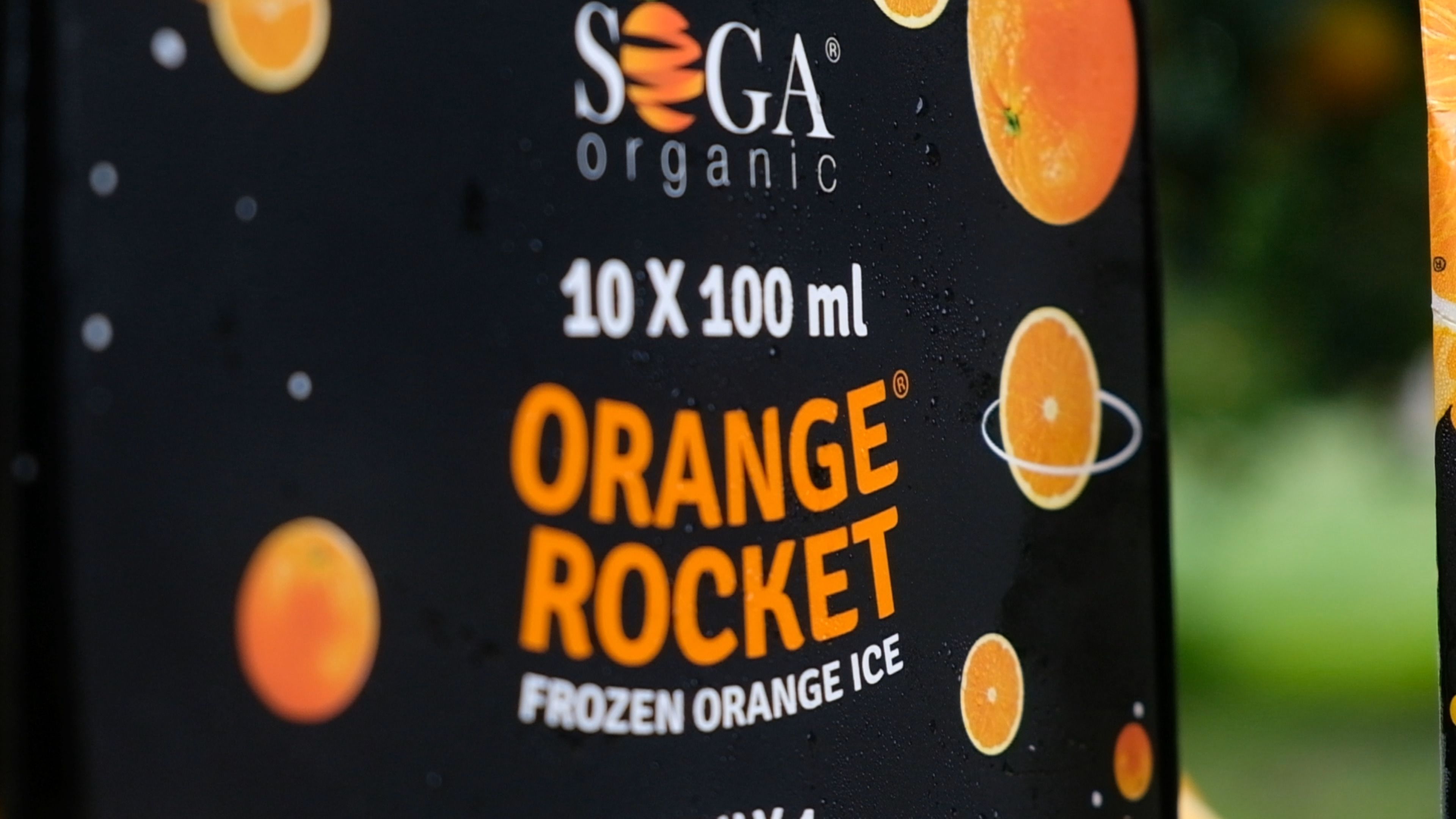 Detail of the Orange Rocket box showing the SOGA Organic logo and 10 x 100 ml label