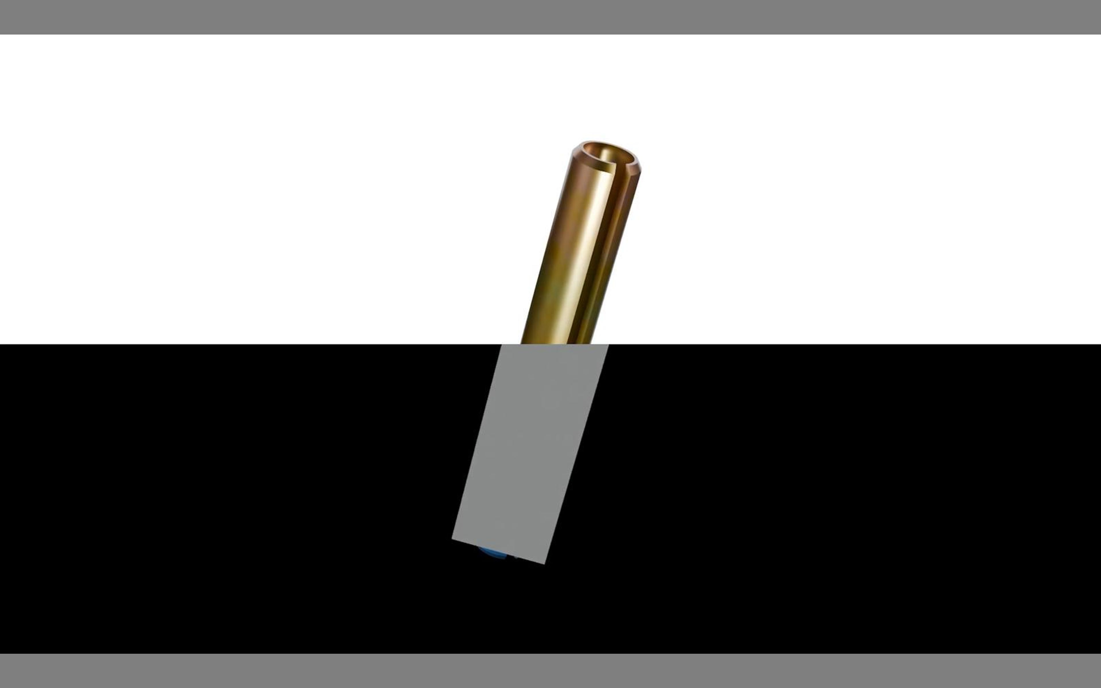 3D progress reveal: a brass pin half in grey clay