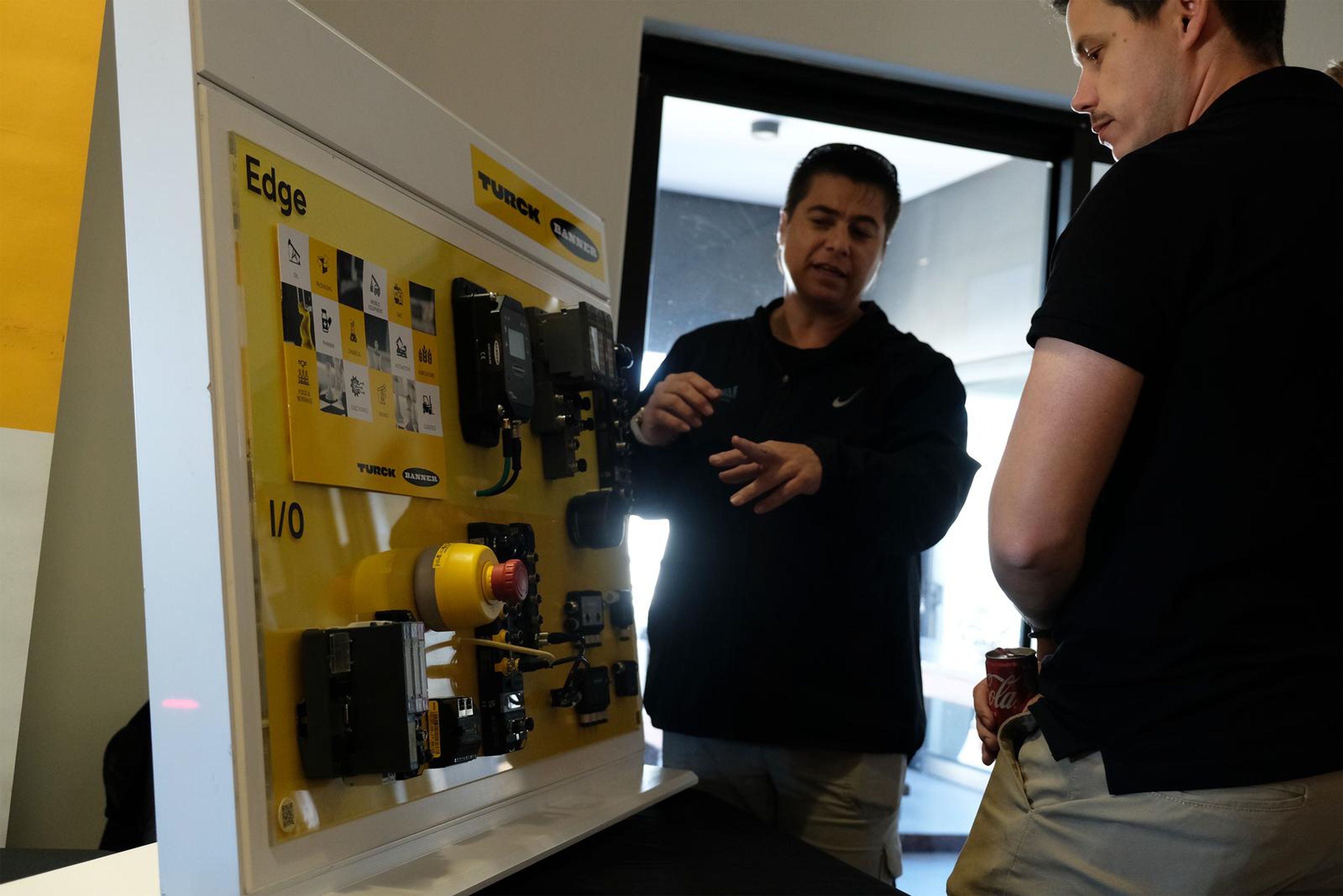 Visitors at the Turck I/O demonstration panel