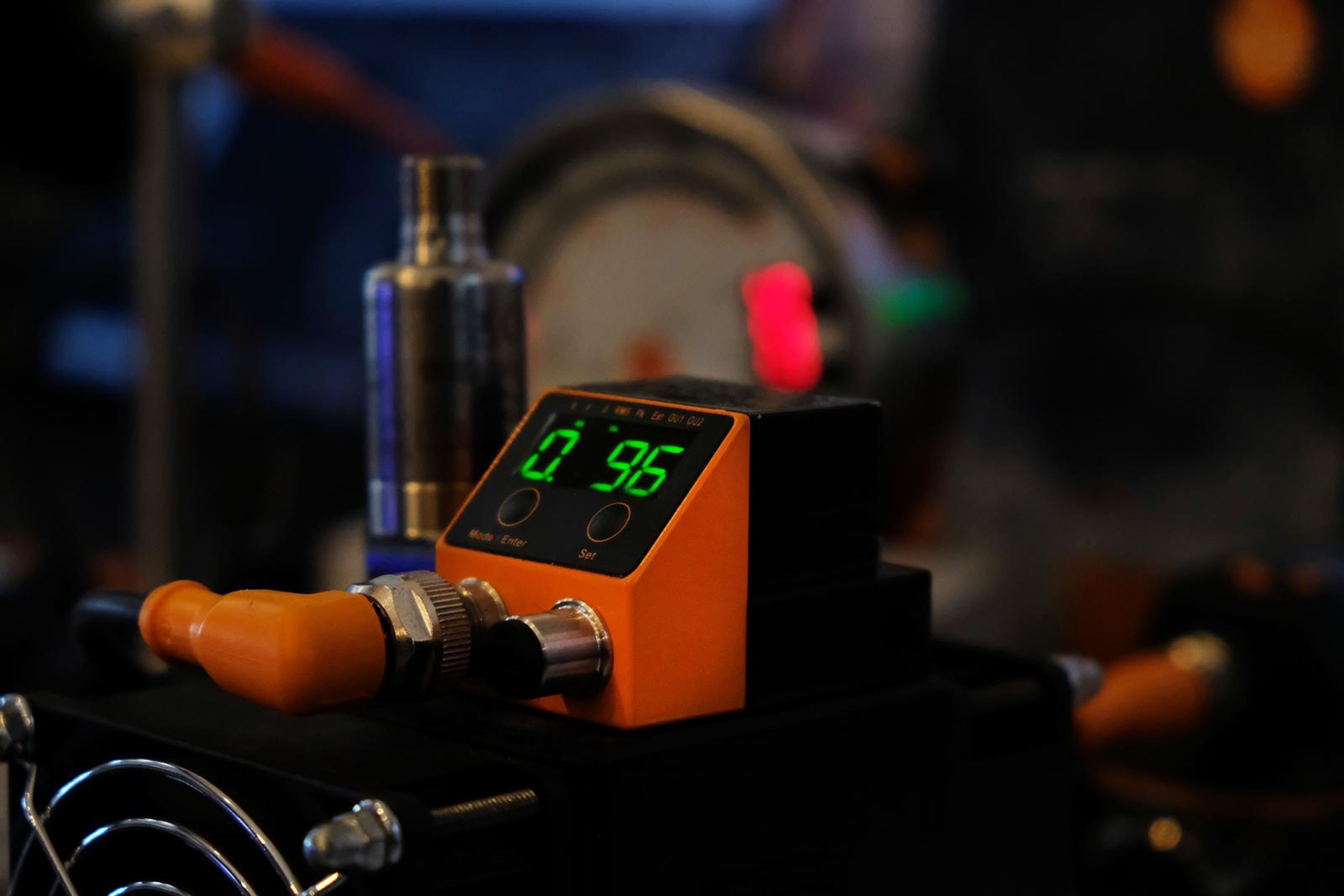 IFM sensor with a glowing green display