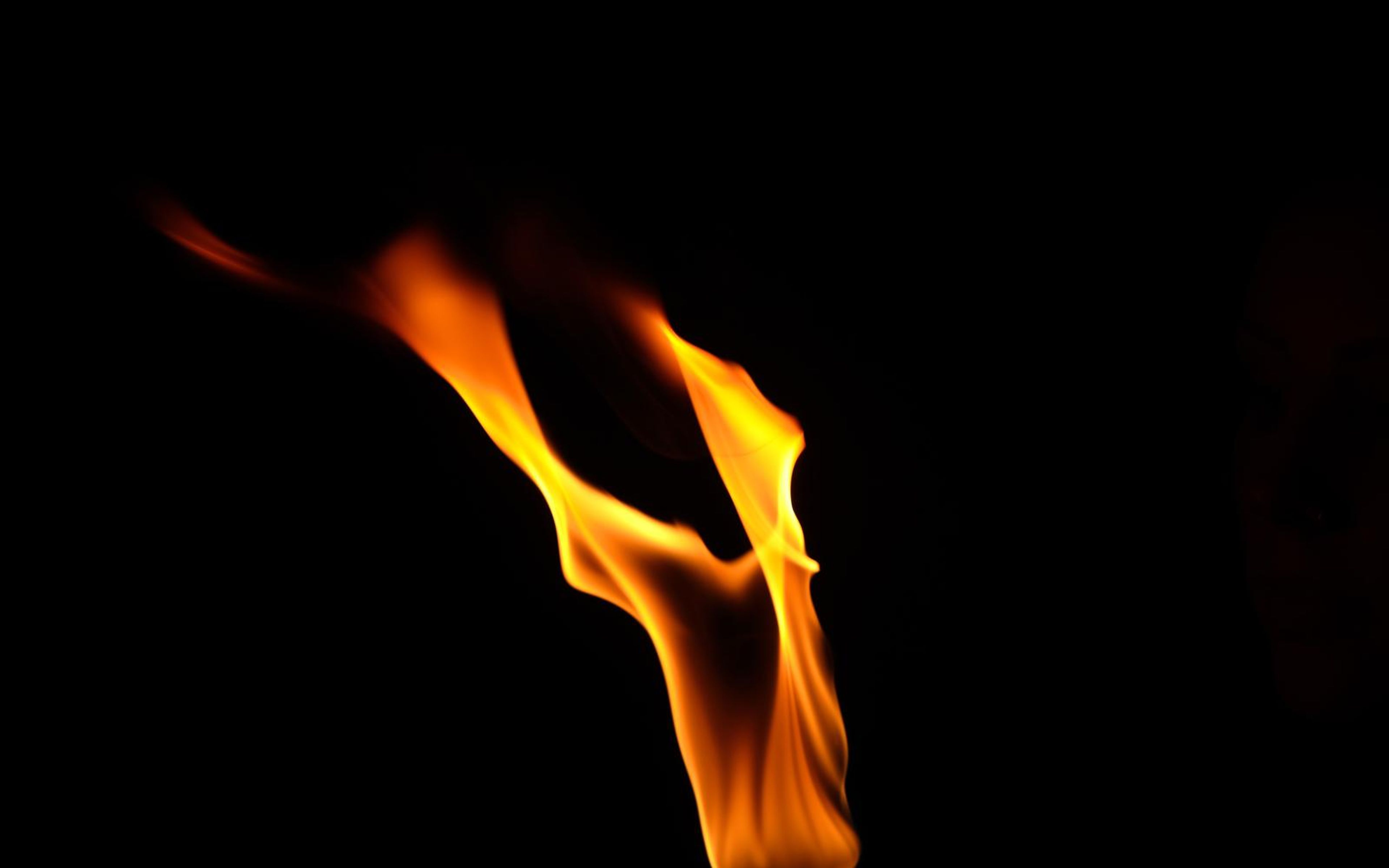 Flame sweeping up and to the left in a long diagonal streak