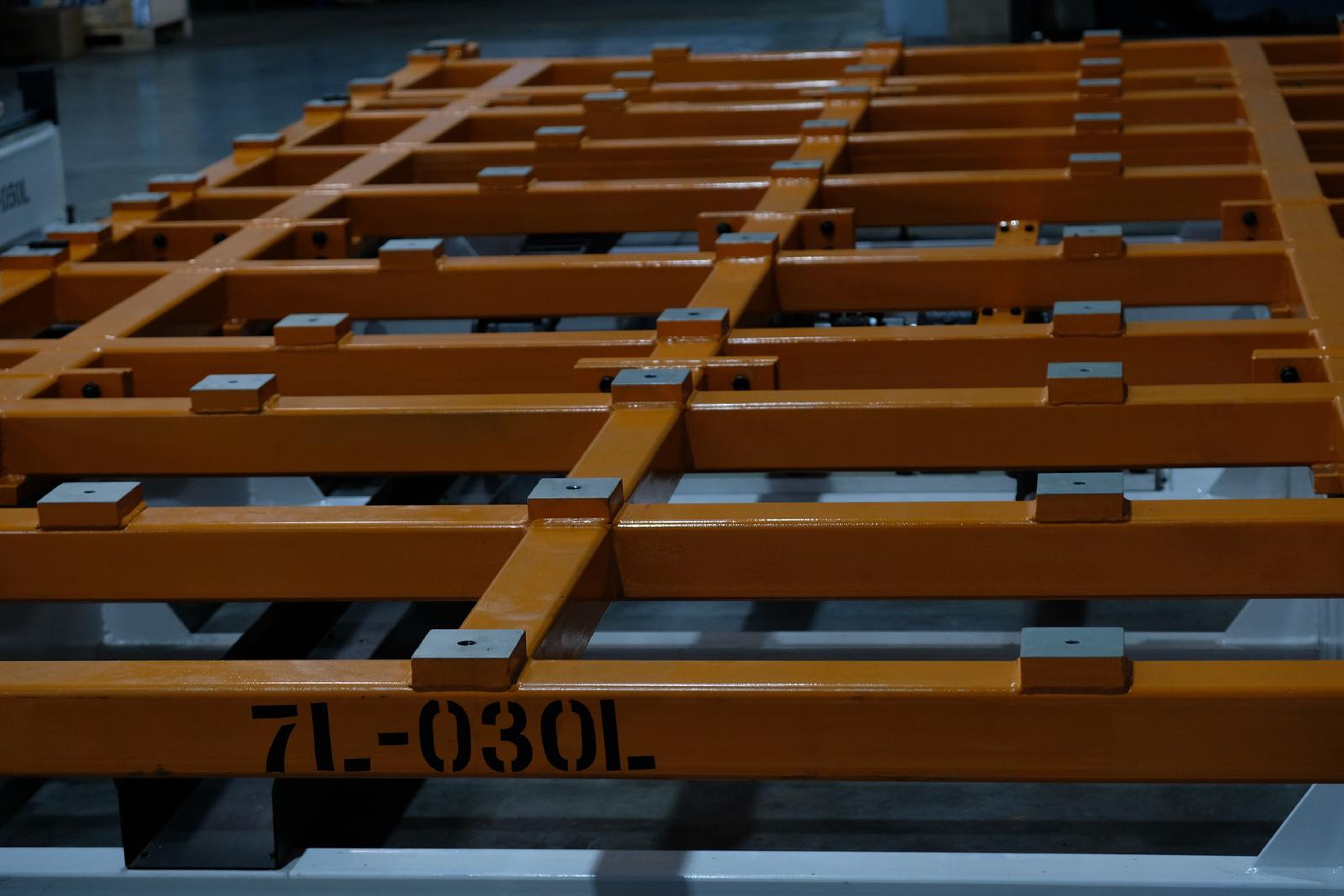 Overhead view of an orange lattice frame stencilled 7L-030L