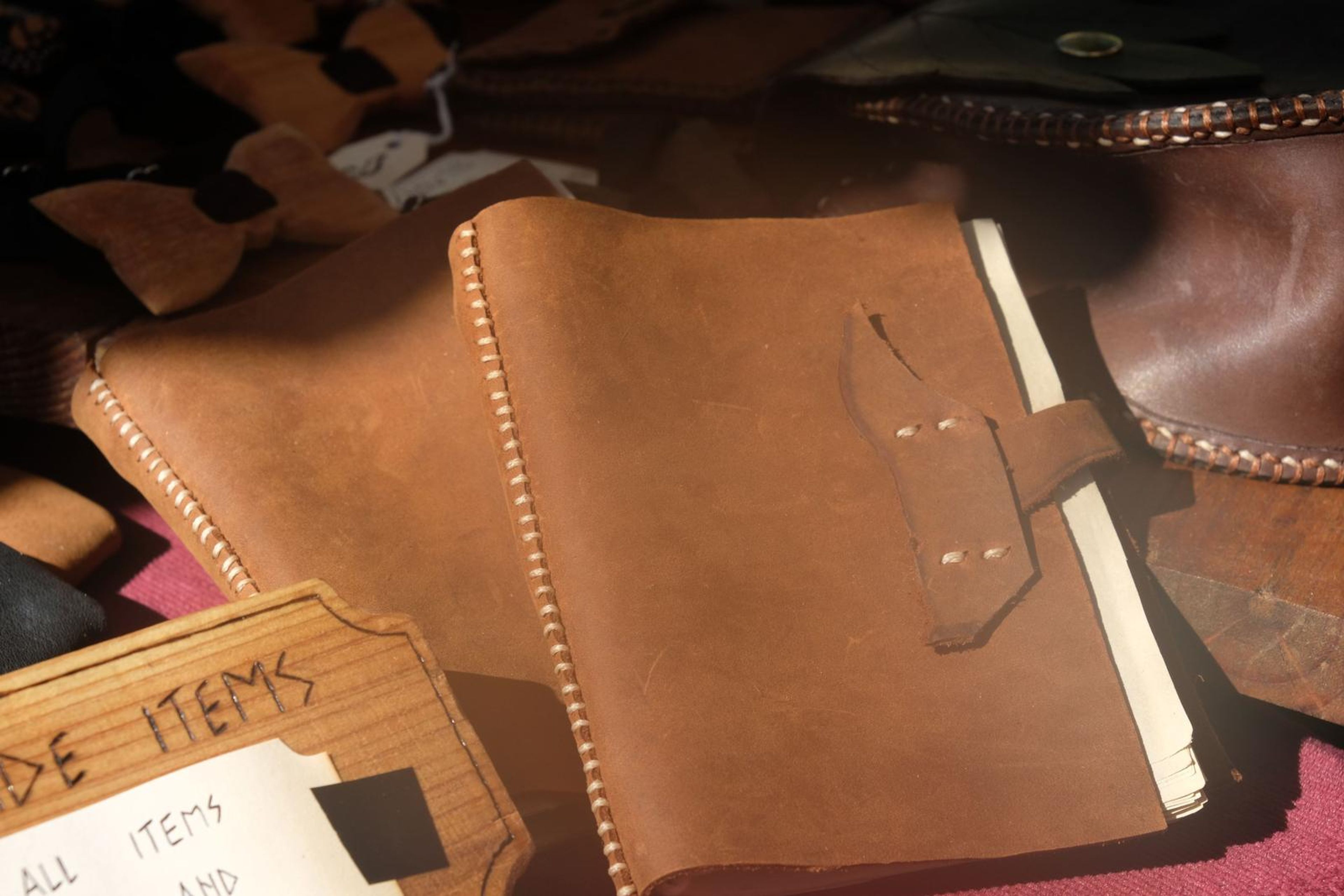 Tan leather journal with stitched edges at the Juuks stall