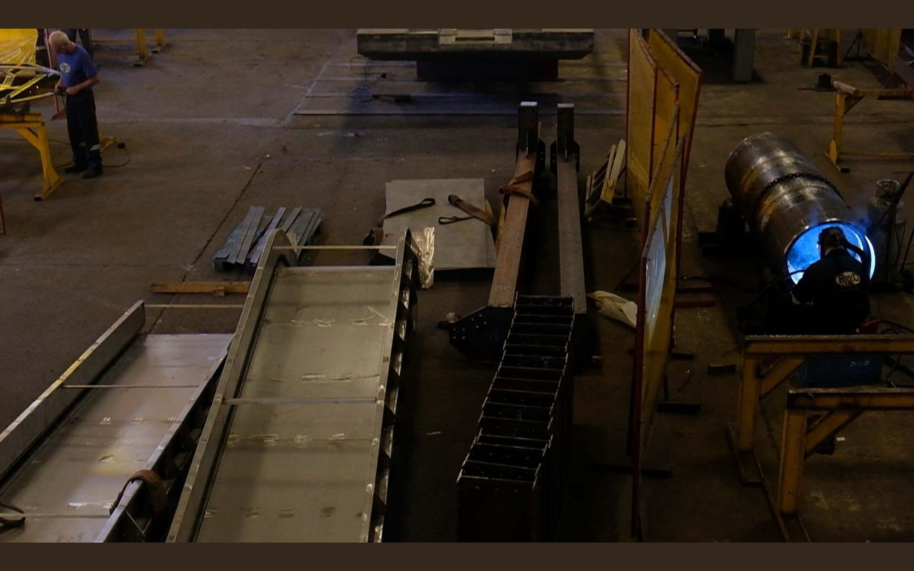 Welding flare in a dim fabrication bay