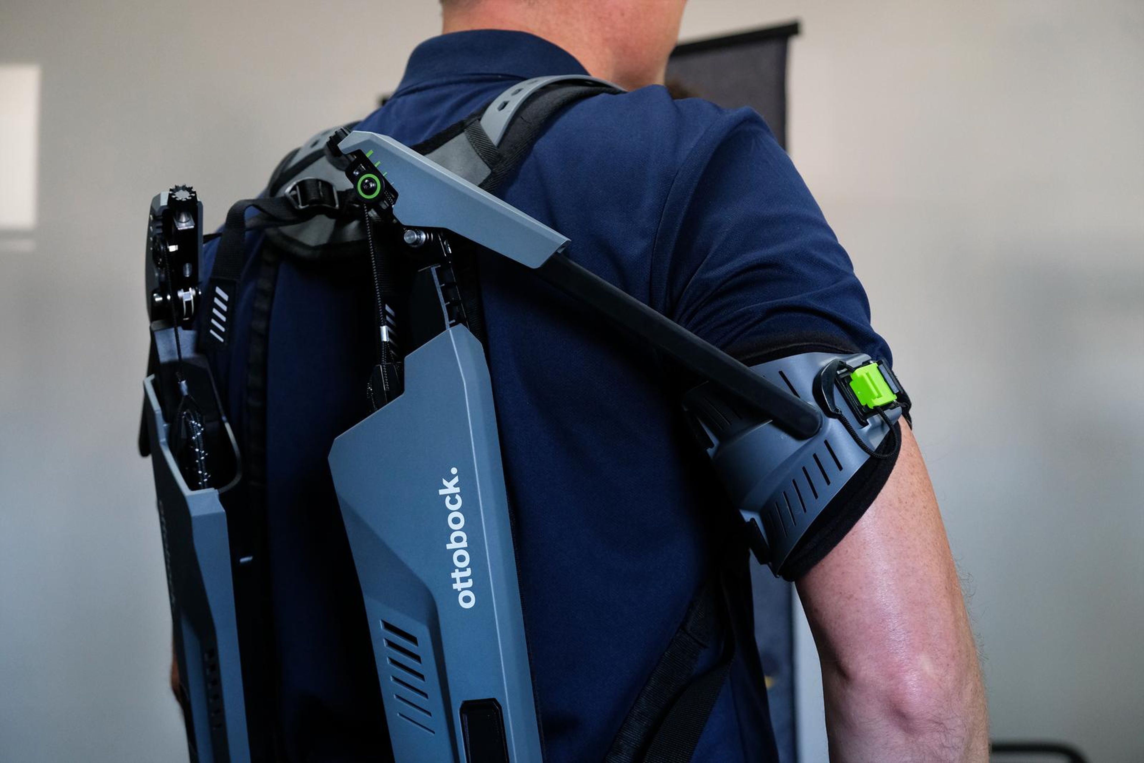 Exoskeleton worn by a visitor, seen from behind