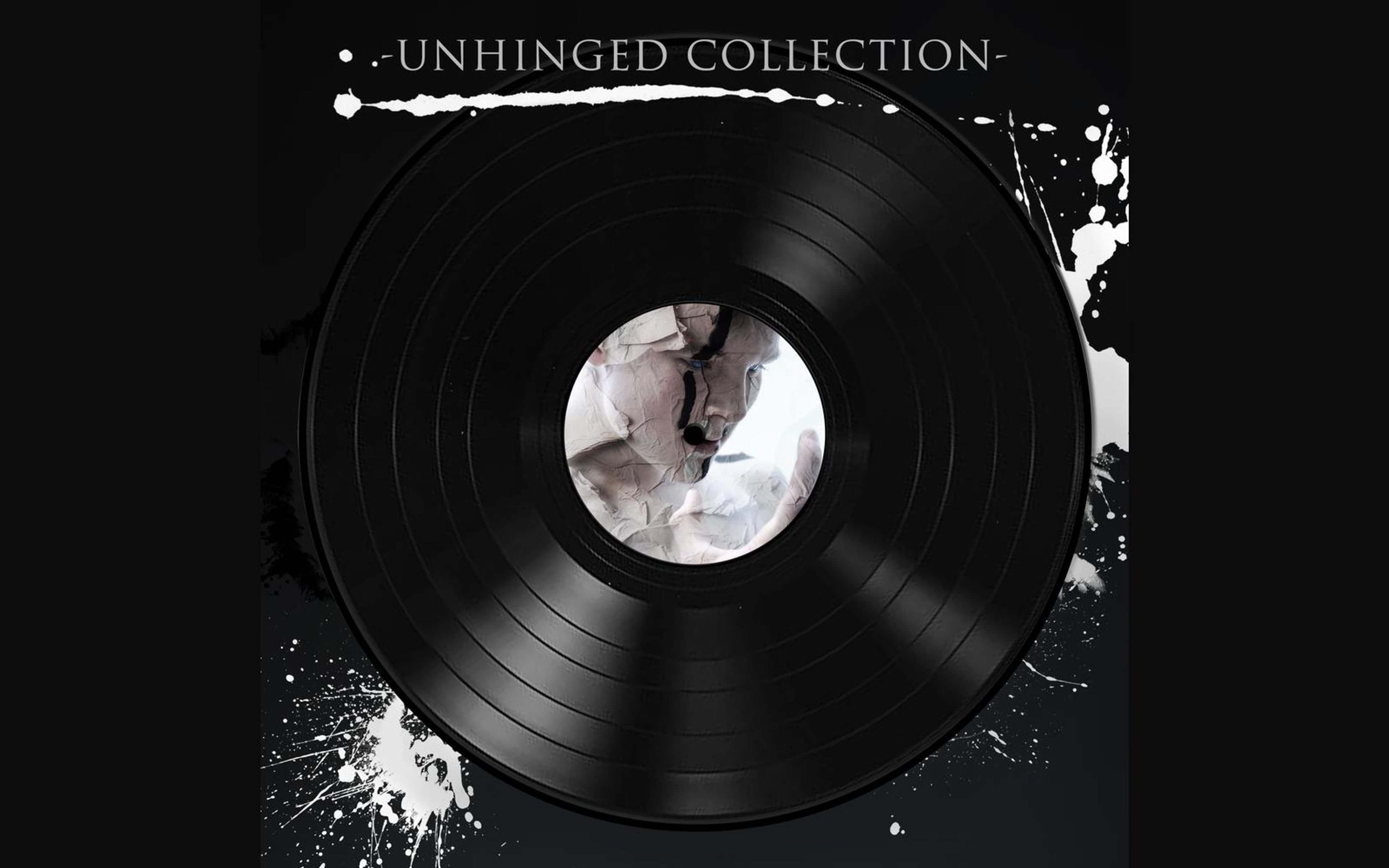 Vinyl record with pale hands gripping a rough grey object on its centre label