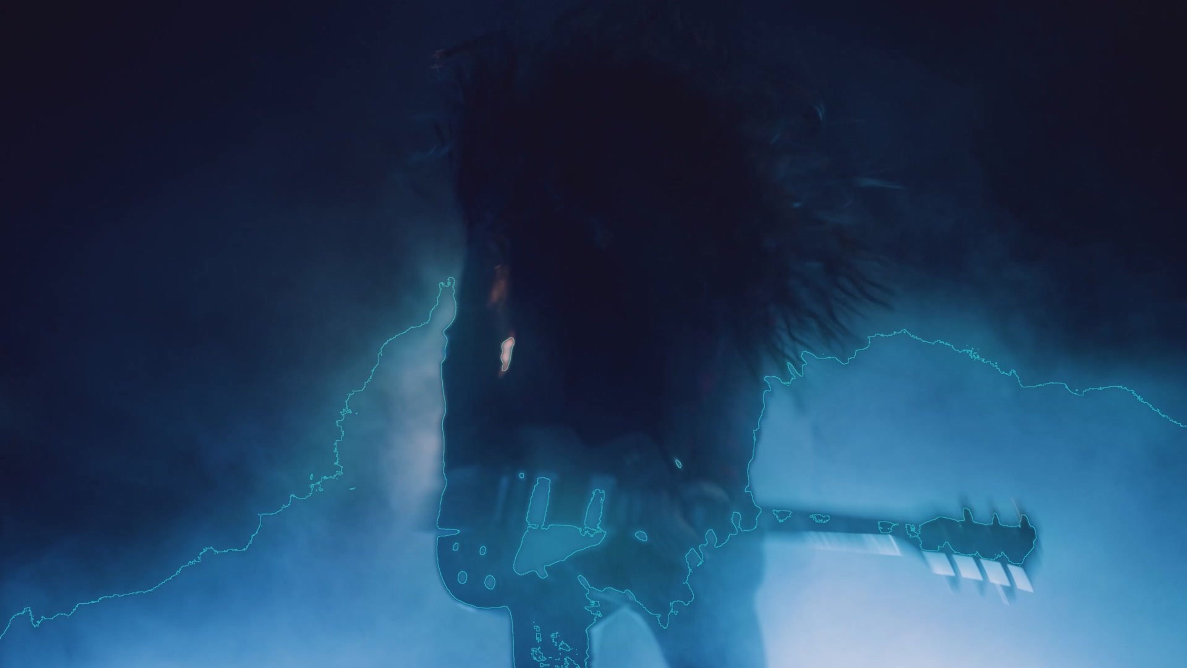 Guitarist in dark clothes and headphones playing in deep blue light between vertical light tubes