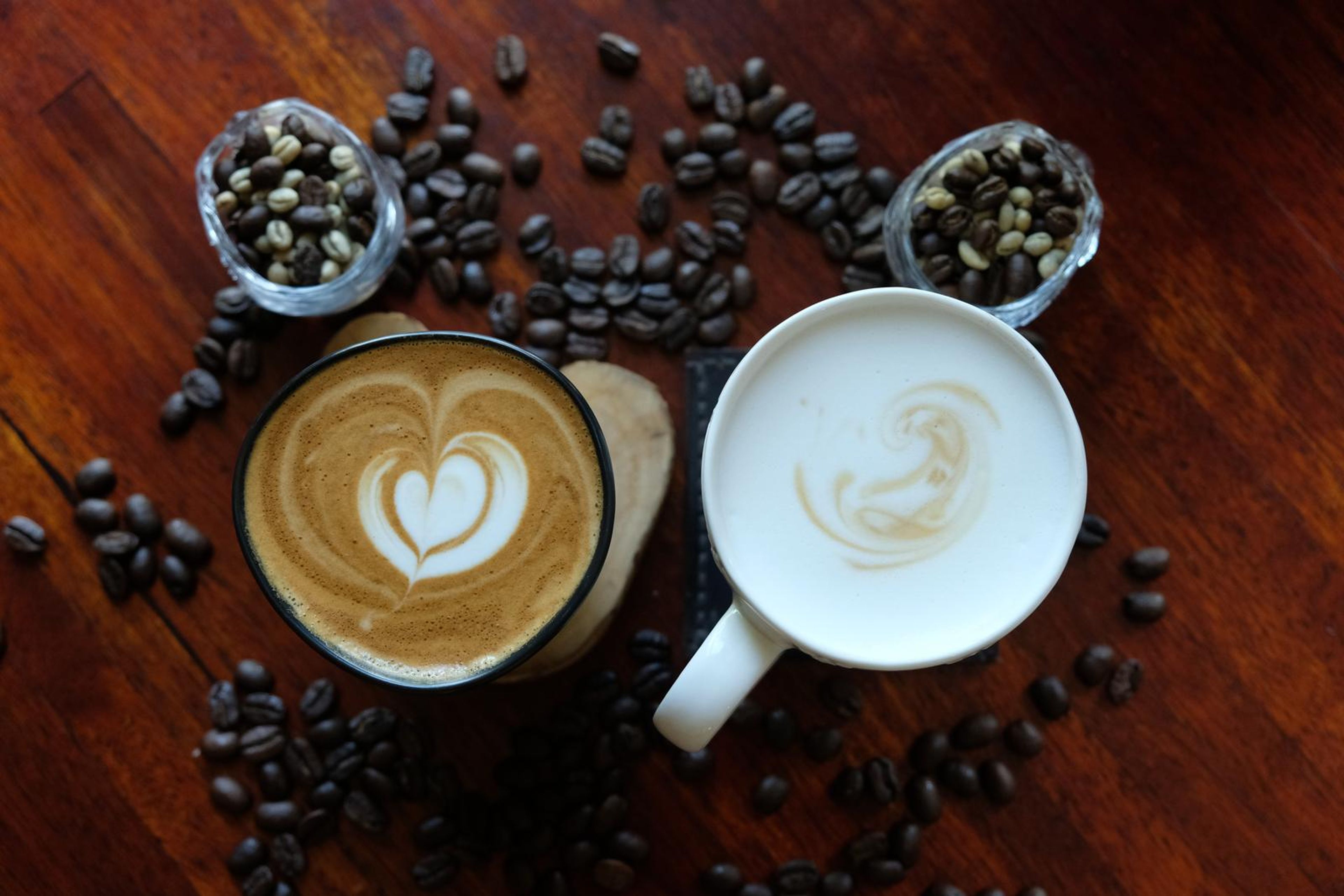 Death By Coffee creative product photography of coffee, beans and branded bags