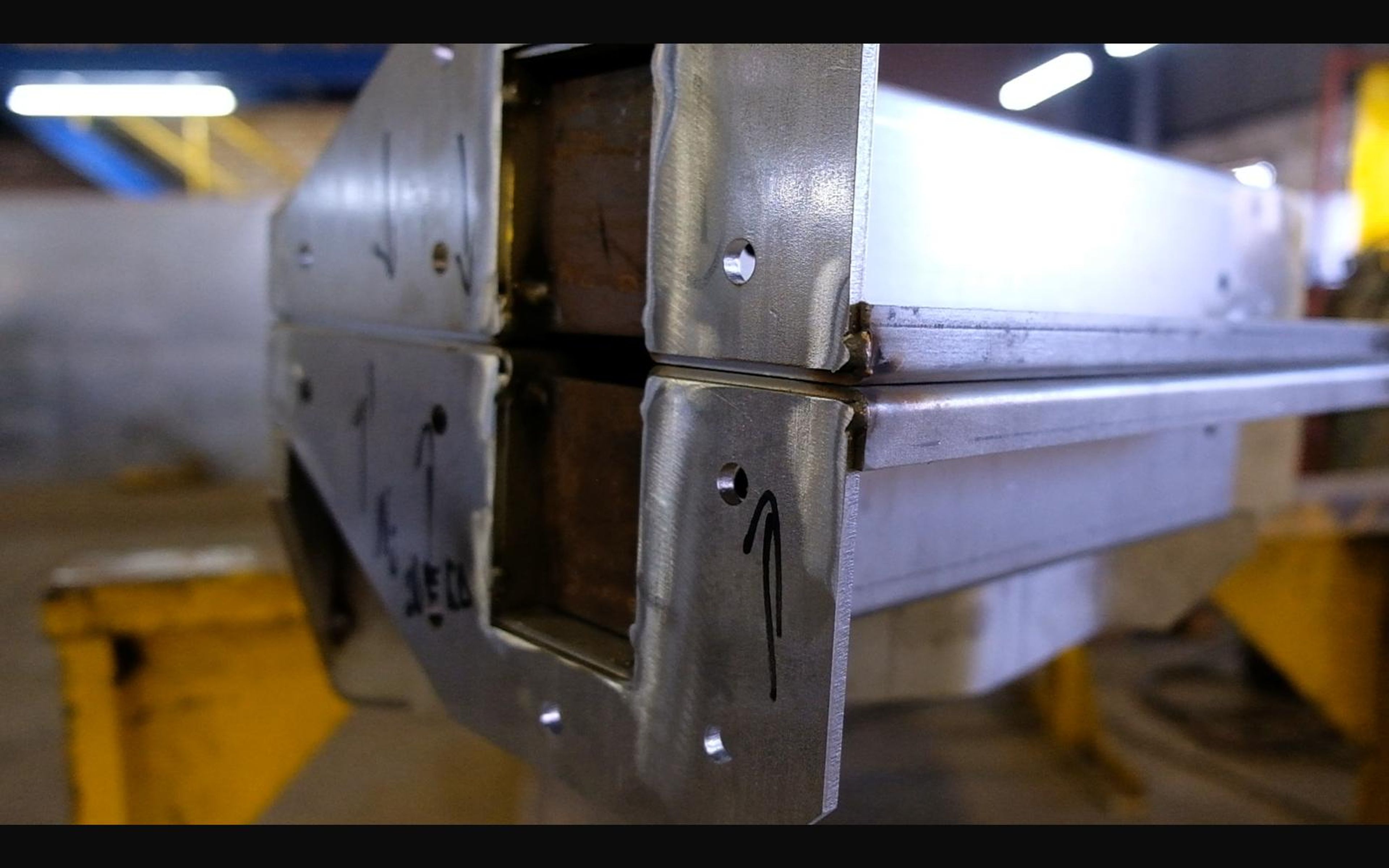 Steel bracket at the end of a beam