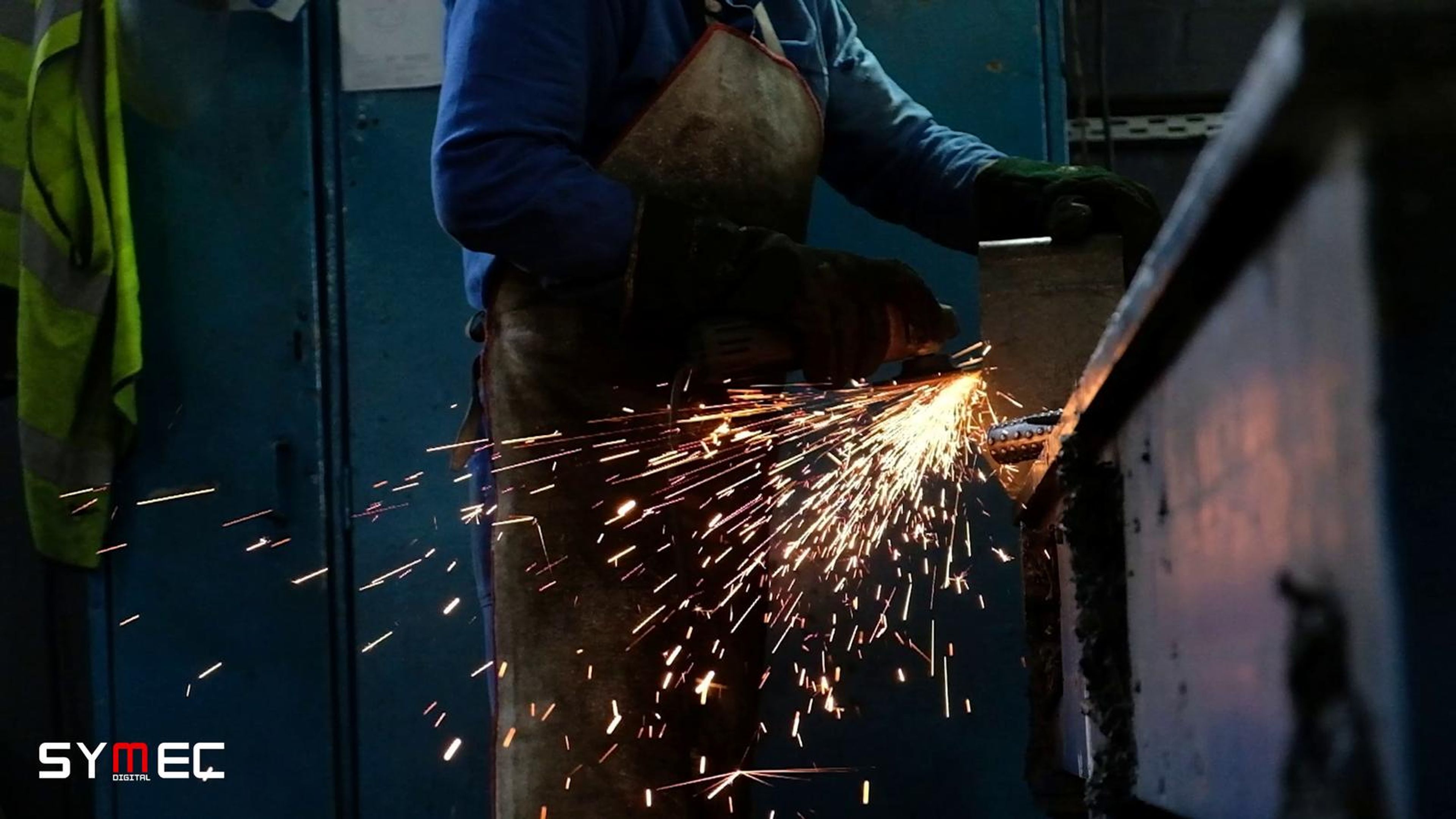 Grinding sparks over a steel bench