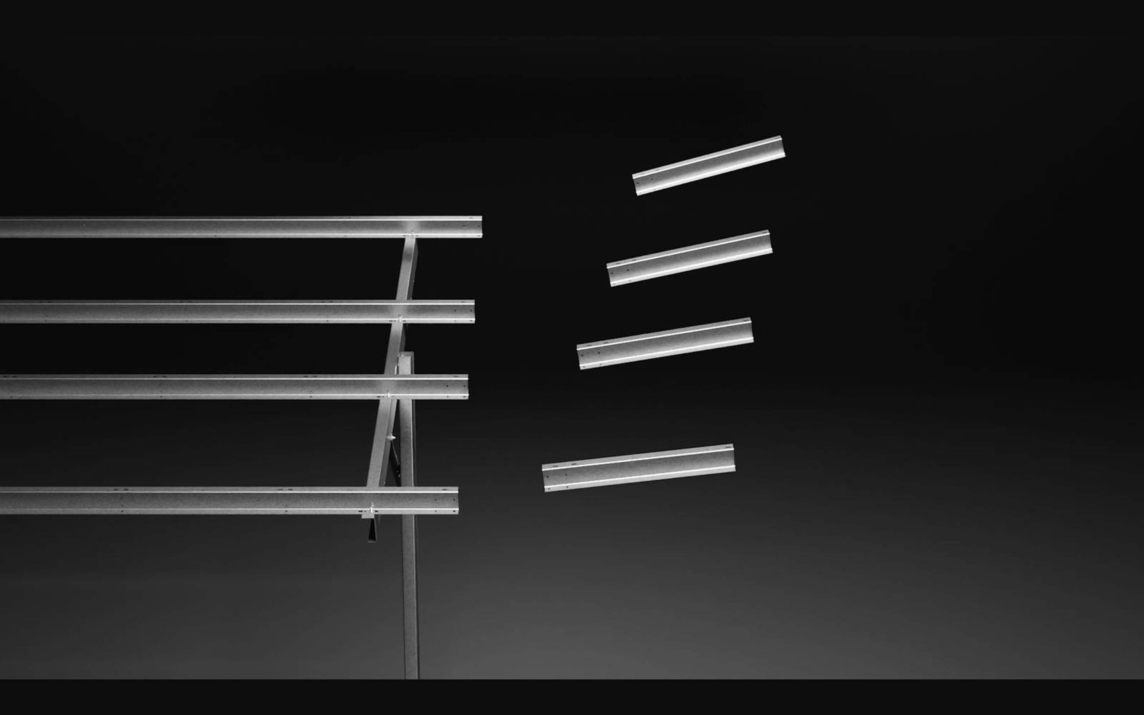 Mounting frame with four rails floating beside separated clamps
