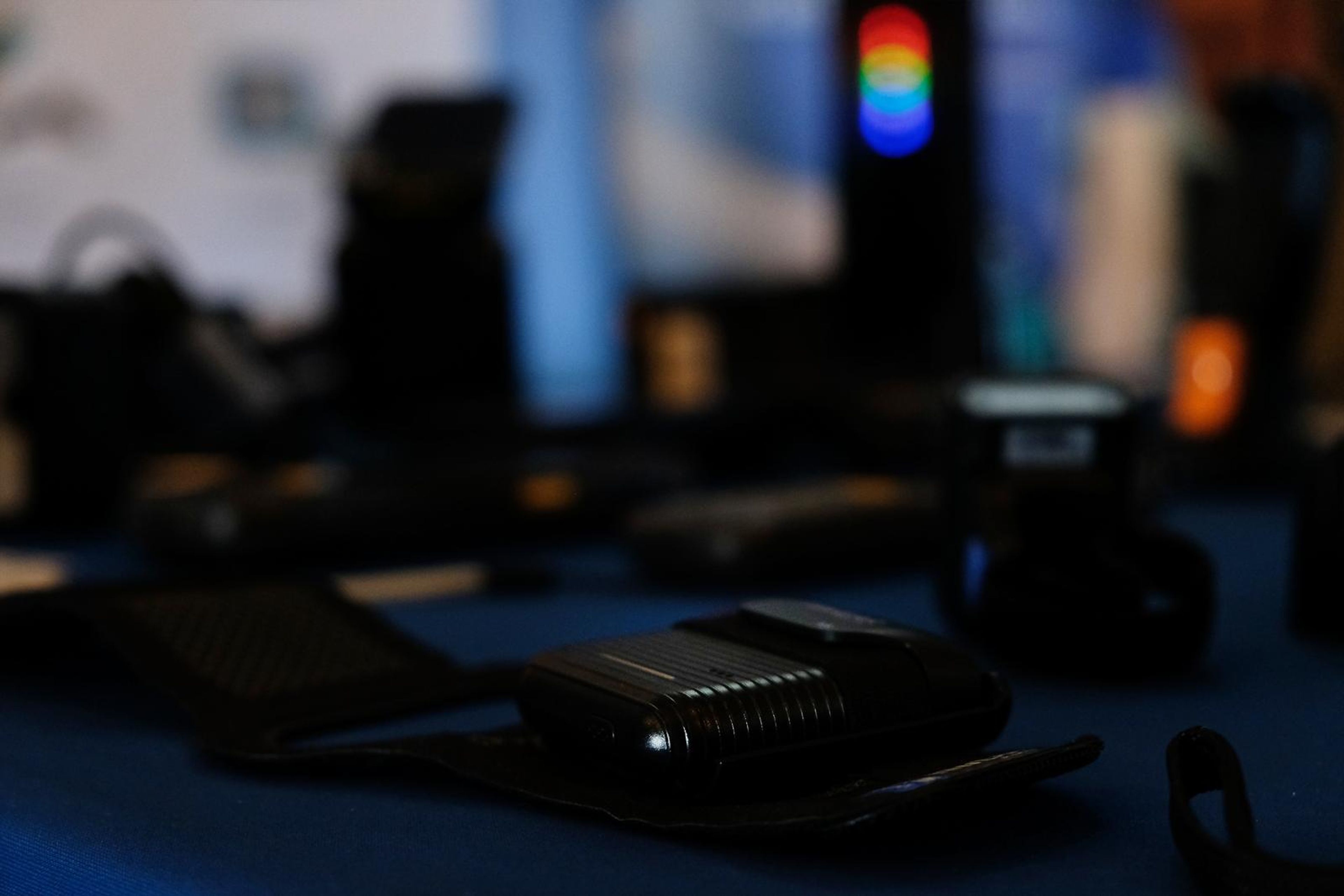 Row of Newland AIDC devices on a table in soft focus