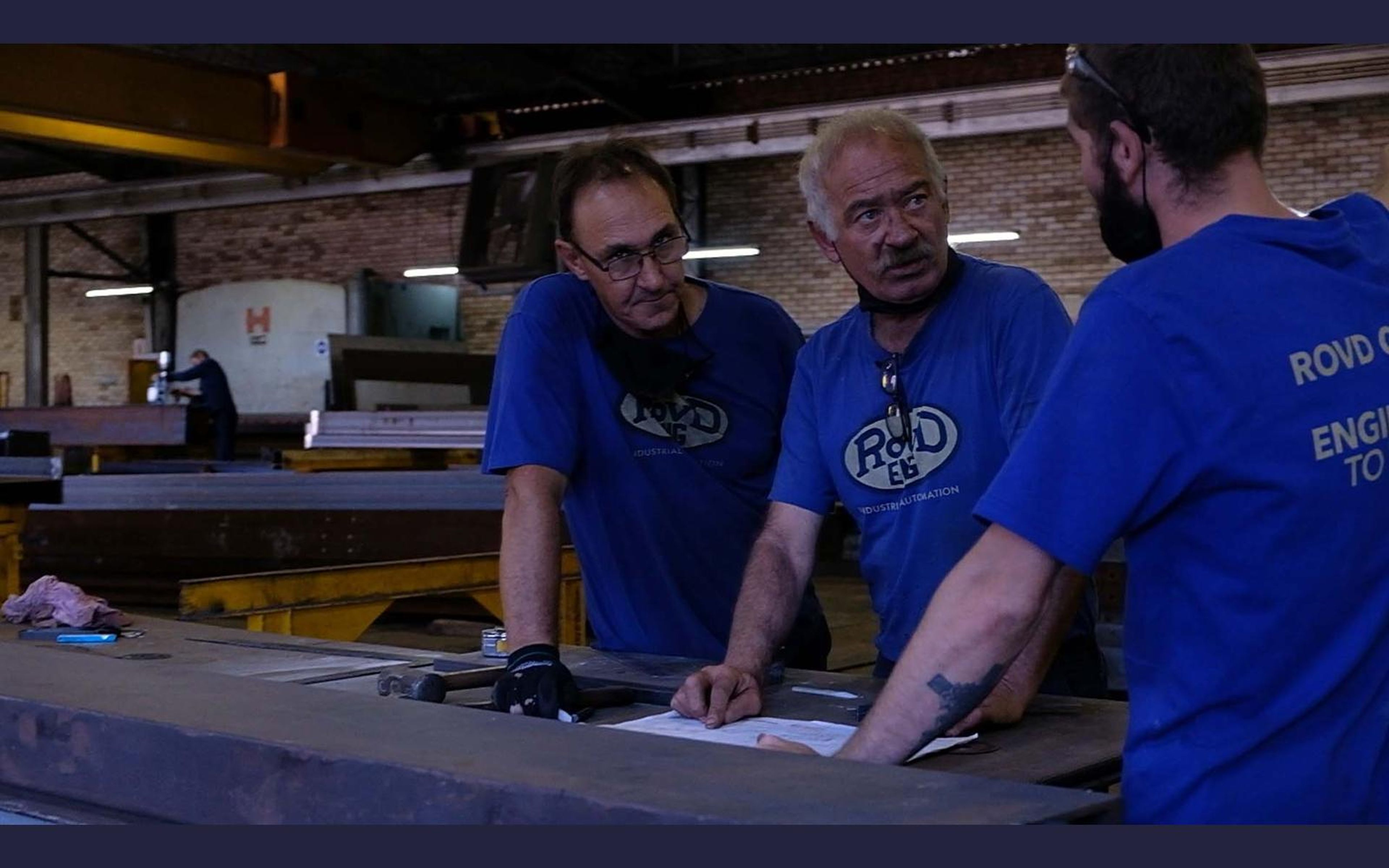 Fabricator marking and measuring steel