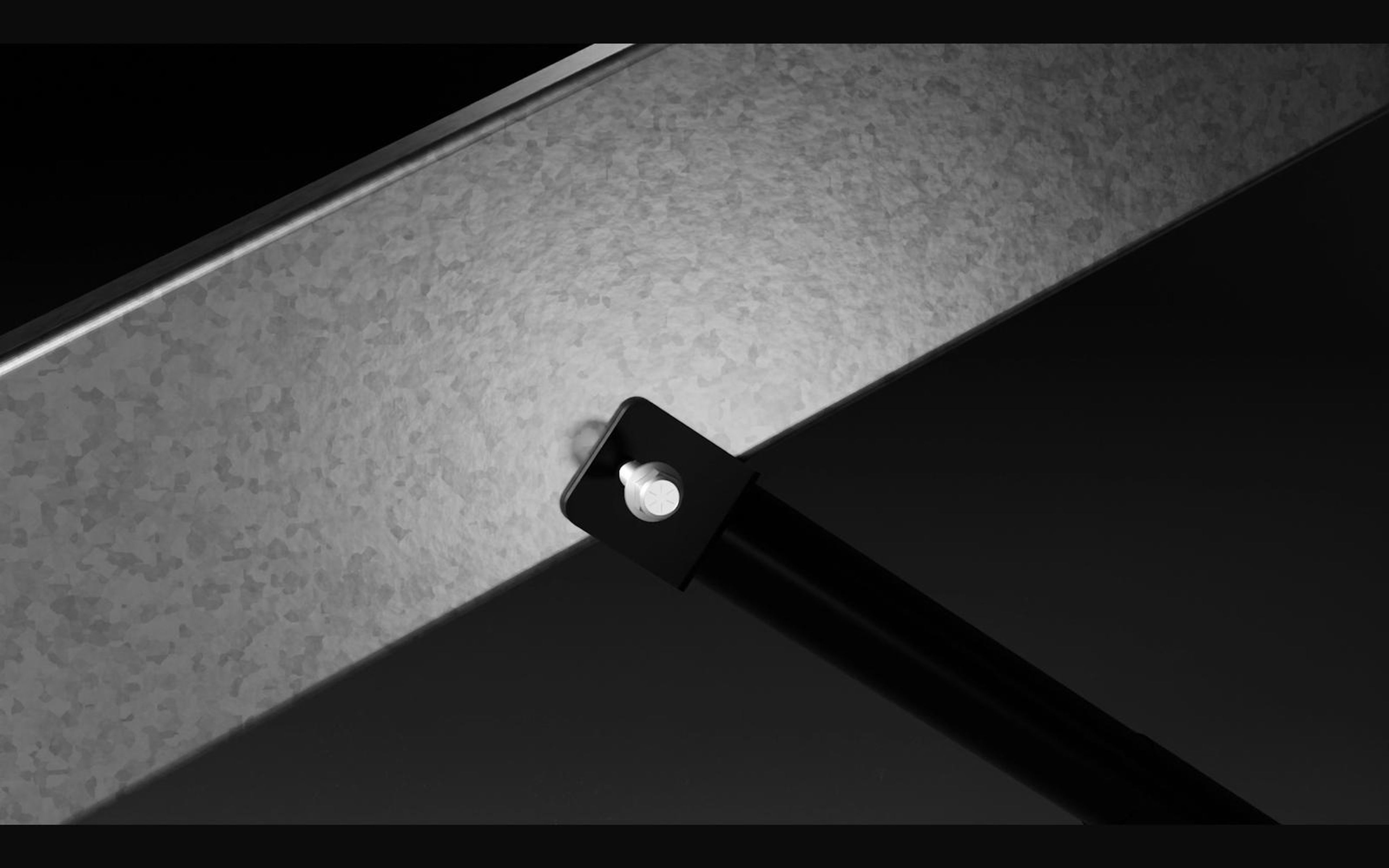 Close view of a galvanised rail with a pivot arm bolt