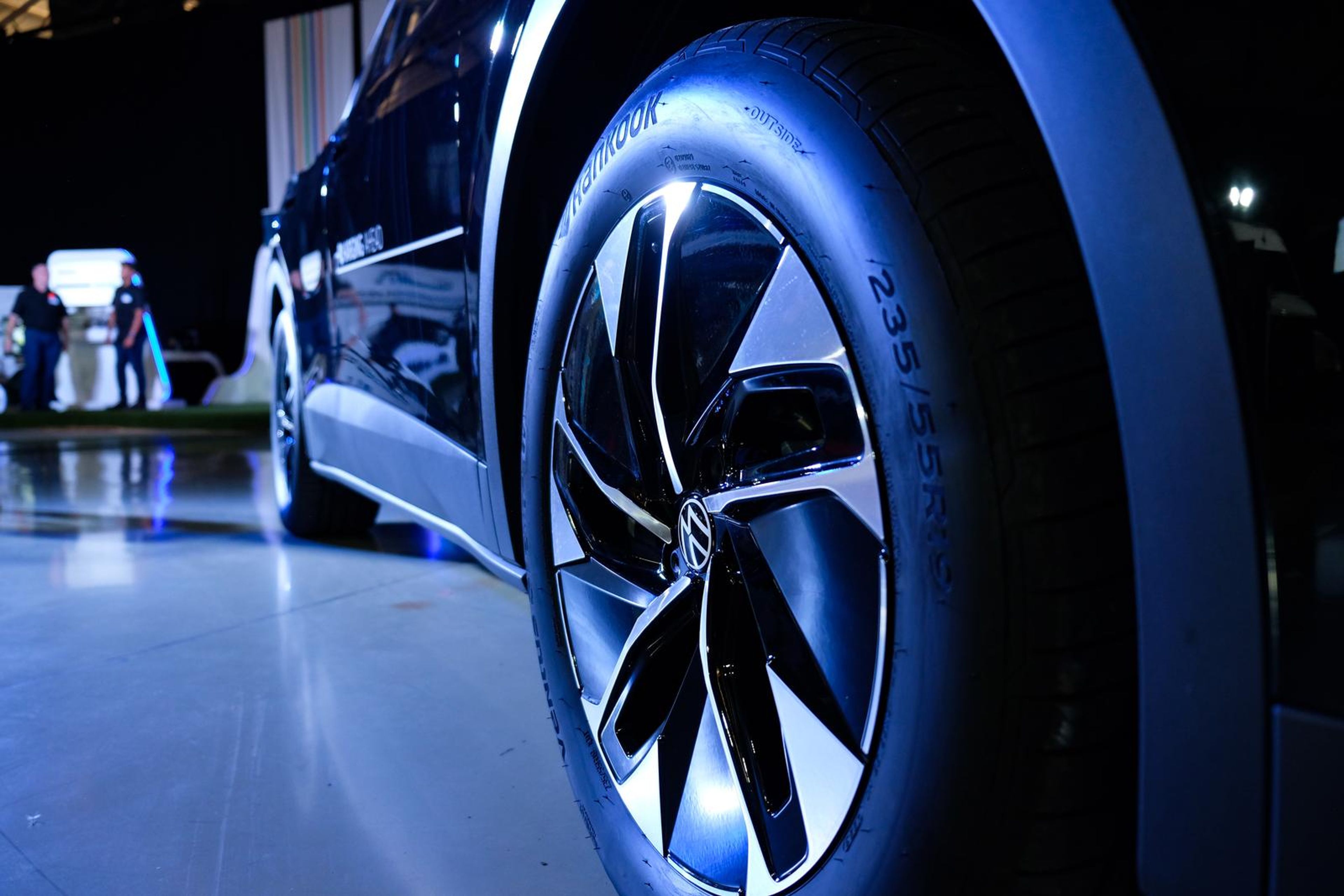 Close view of a Volkswagen wheel and tyre under blue light