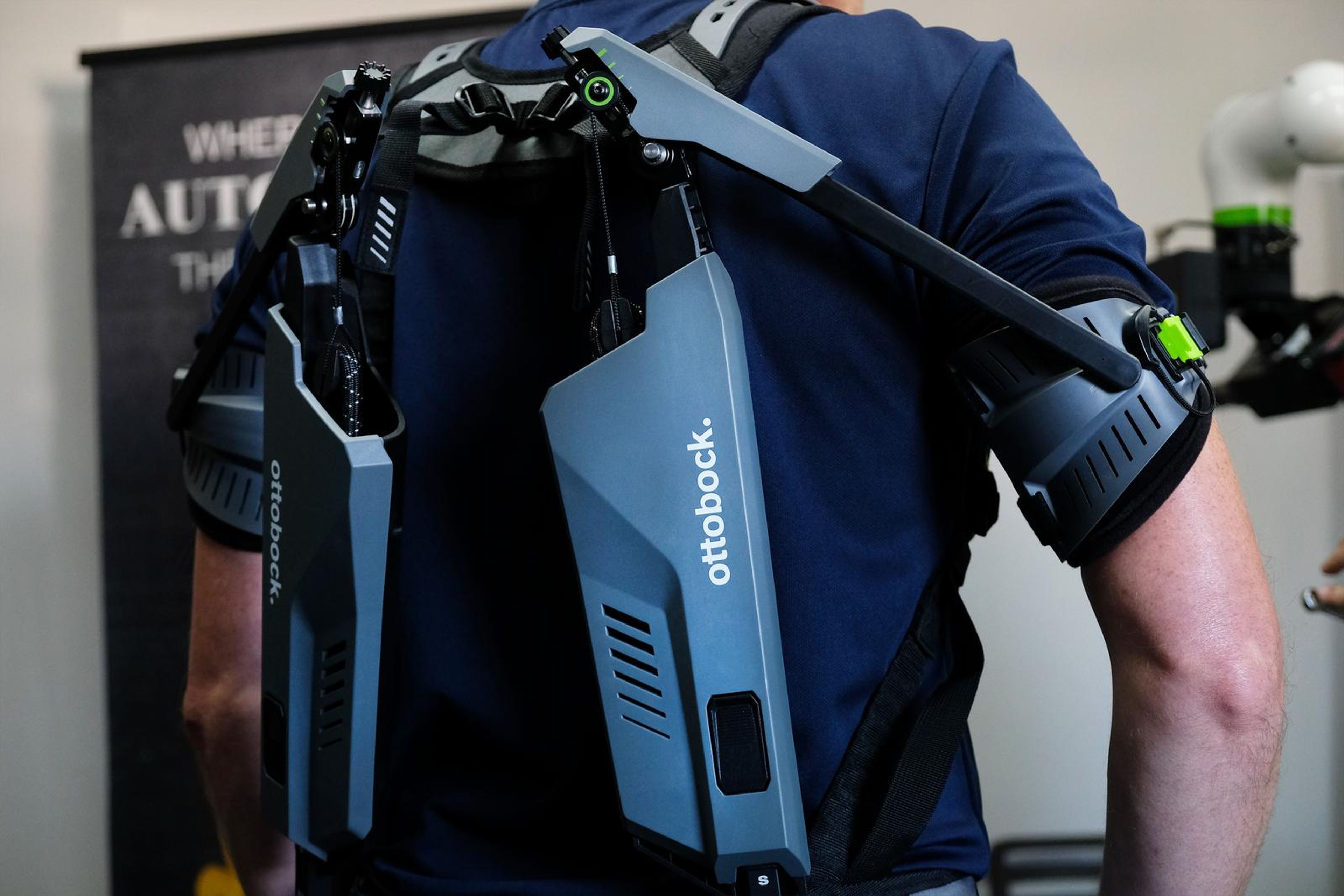 Exoskeleton and belt worn at the SuitX stand
