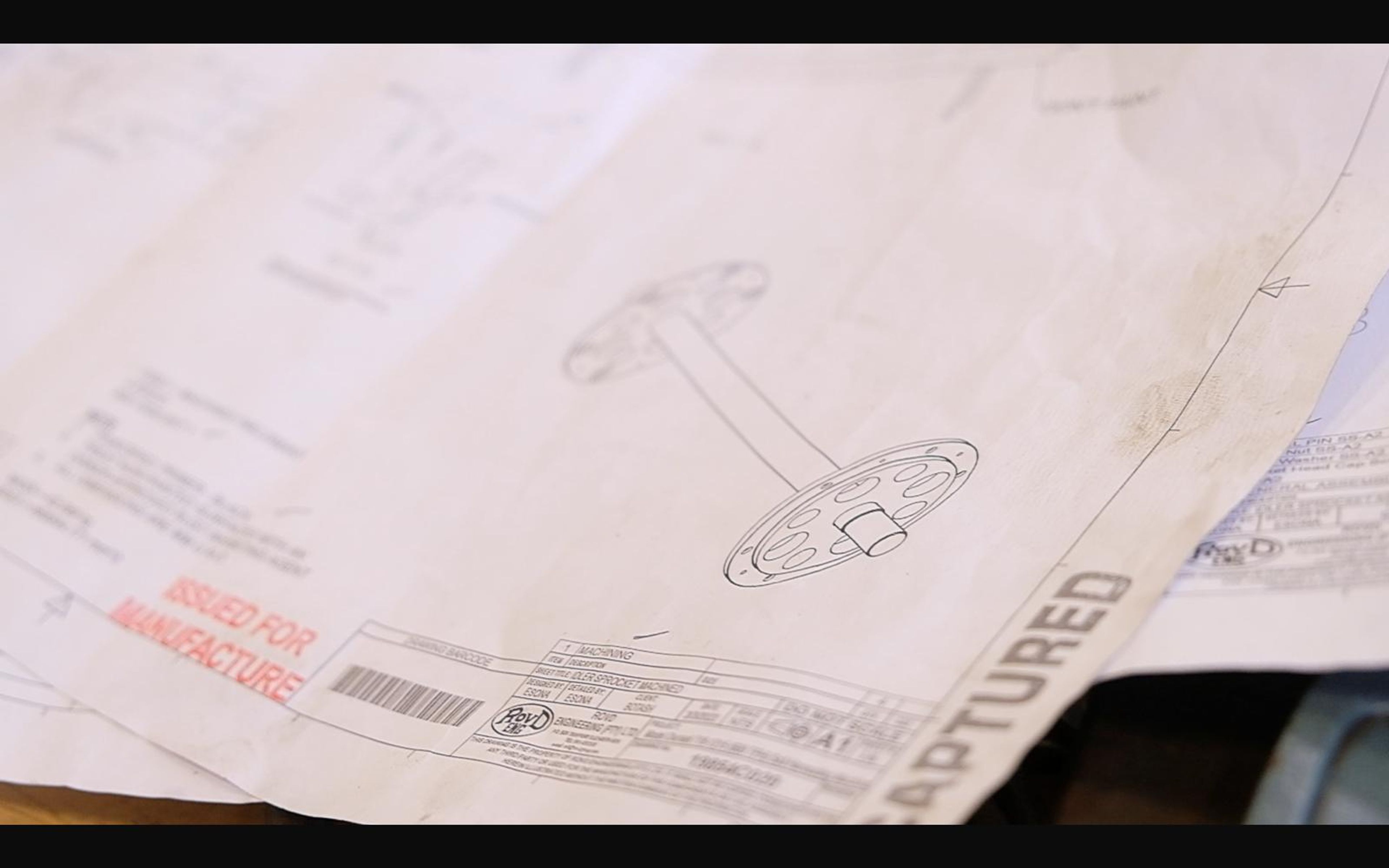 Engineering drawing of a wheel and shaft
