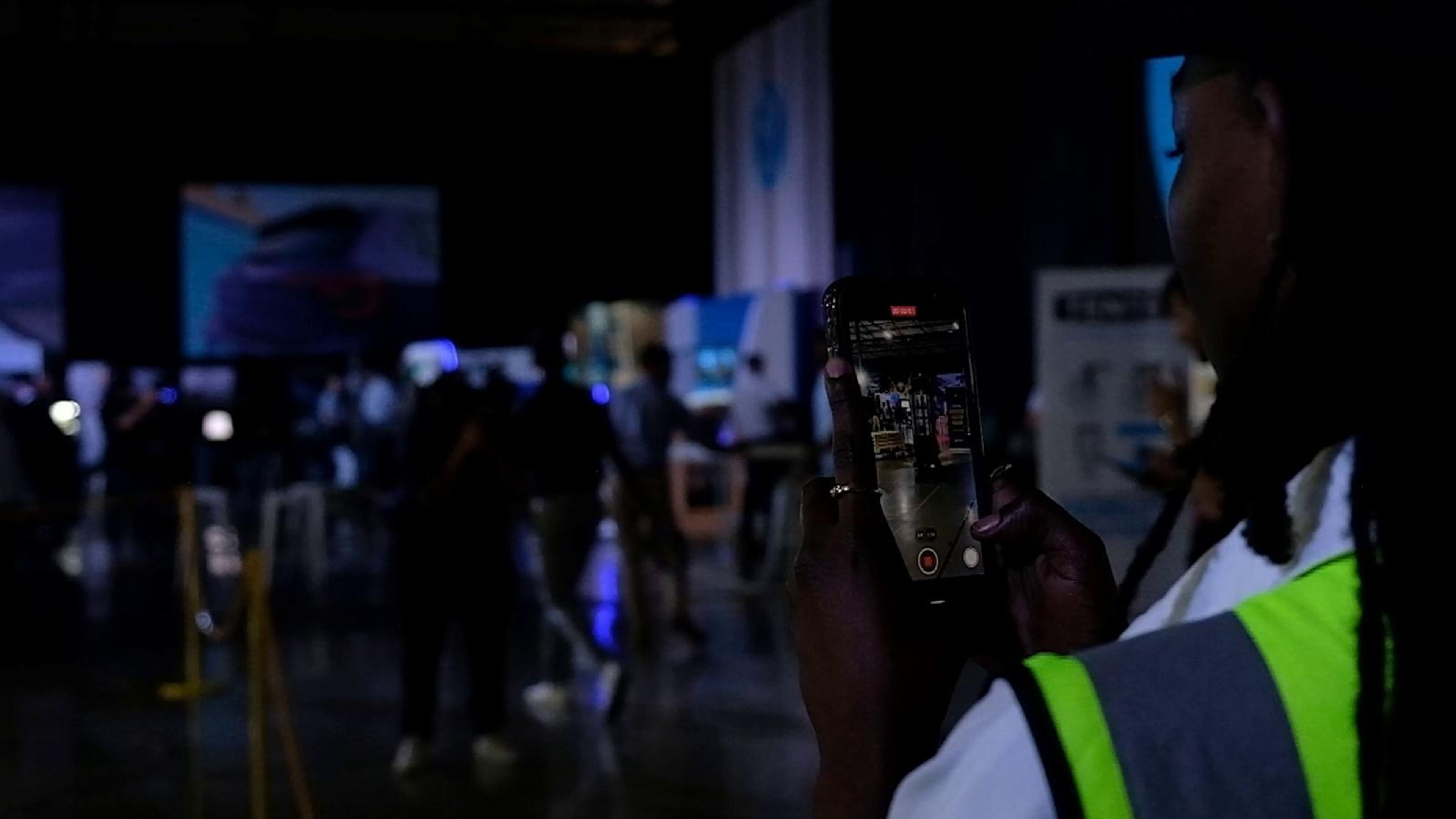 Autonomous mobile robot with a white light bar crossing the floor