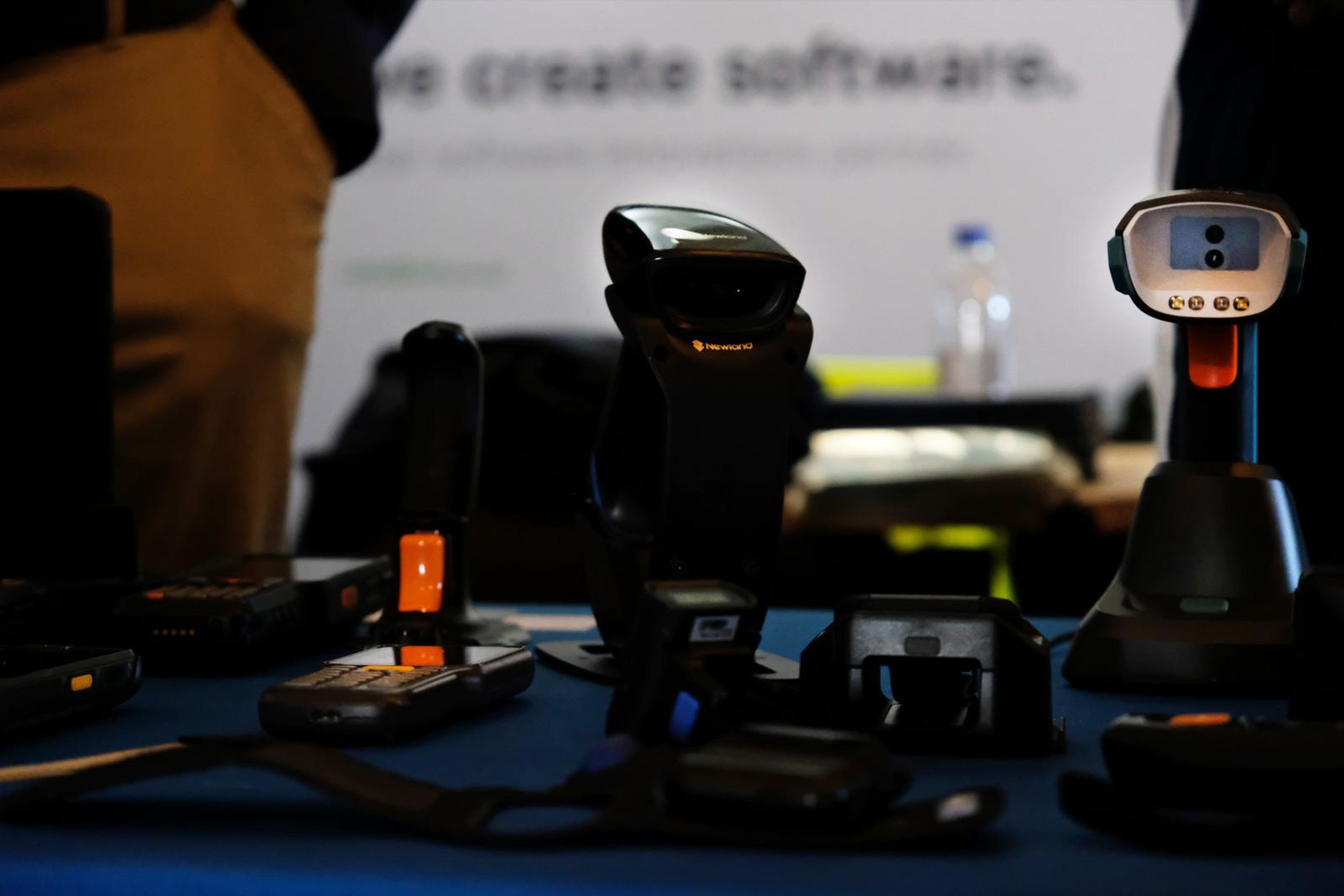 Newland AIDC handheld scanner on its dock