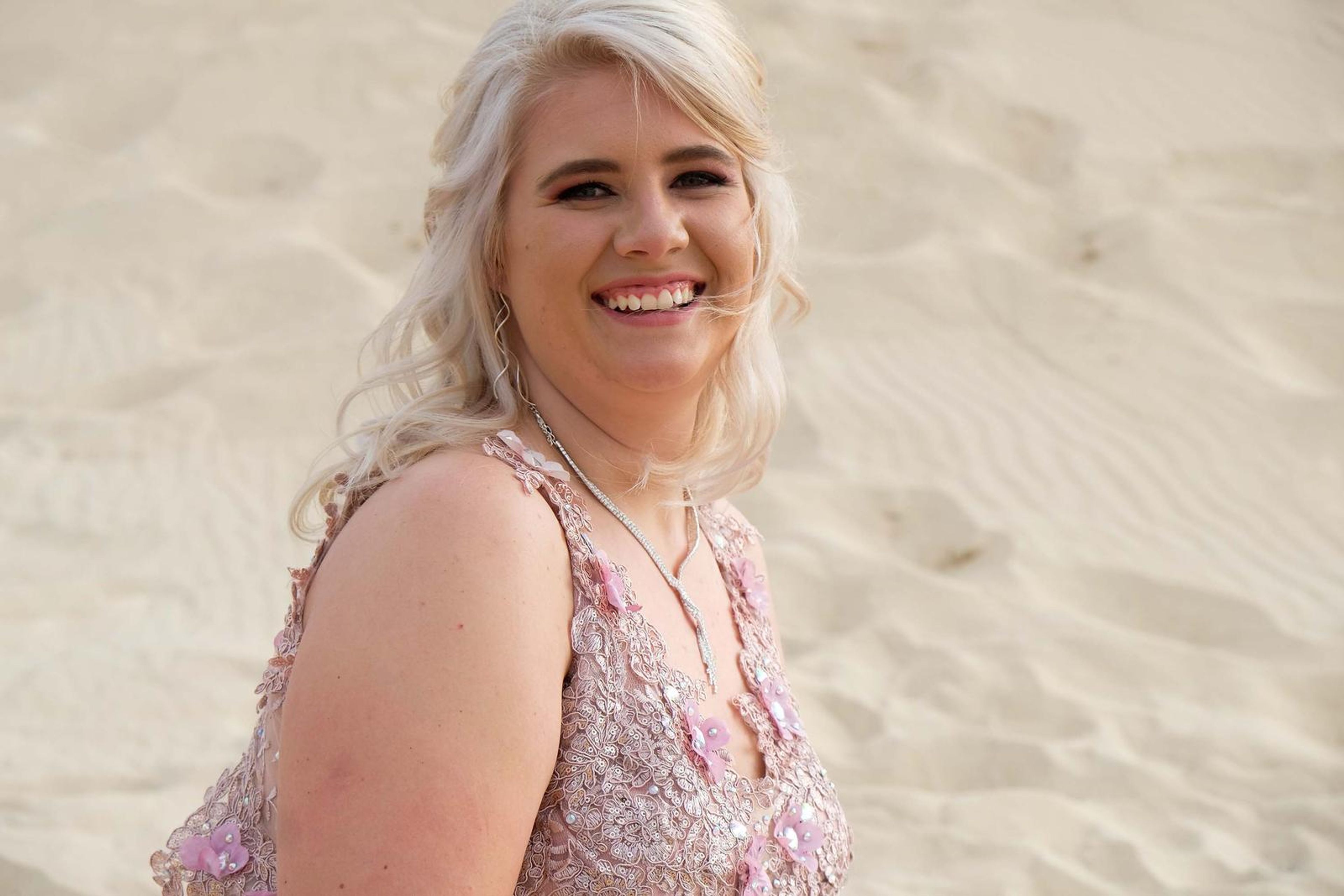 Smiling portrait on the dune