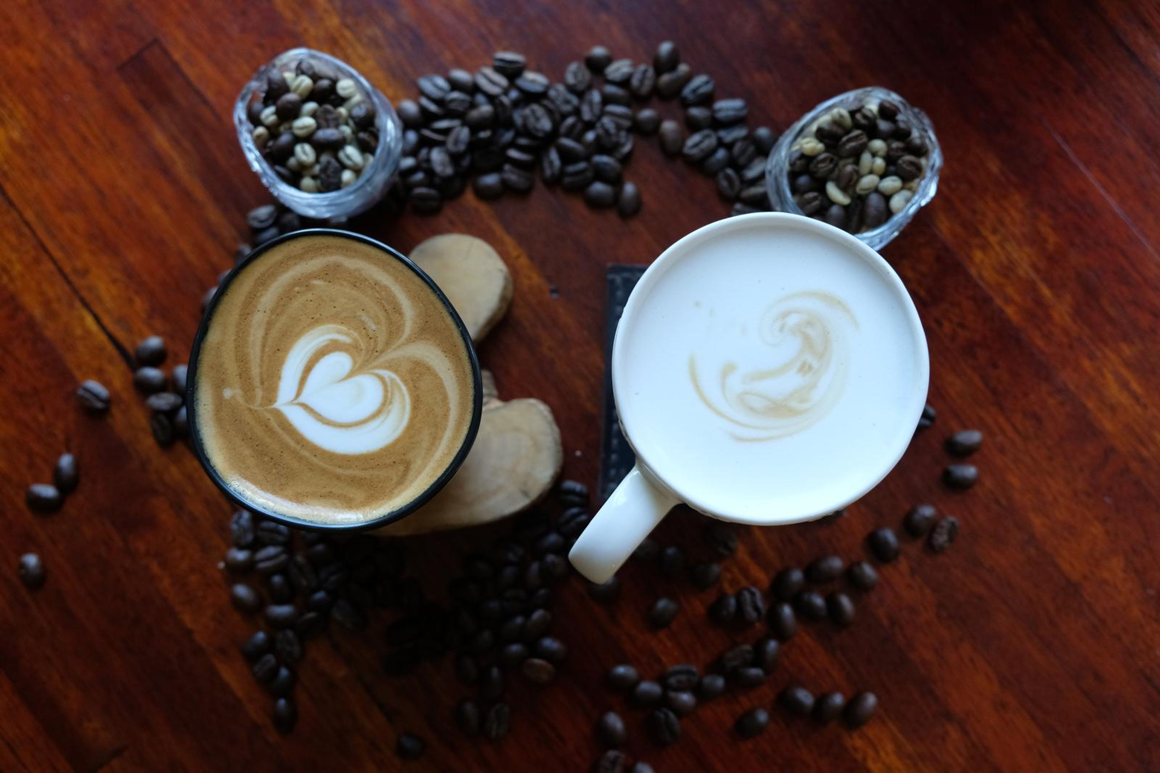 Death By Coffee creative product photography of coffee, beans and branded bags
