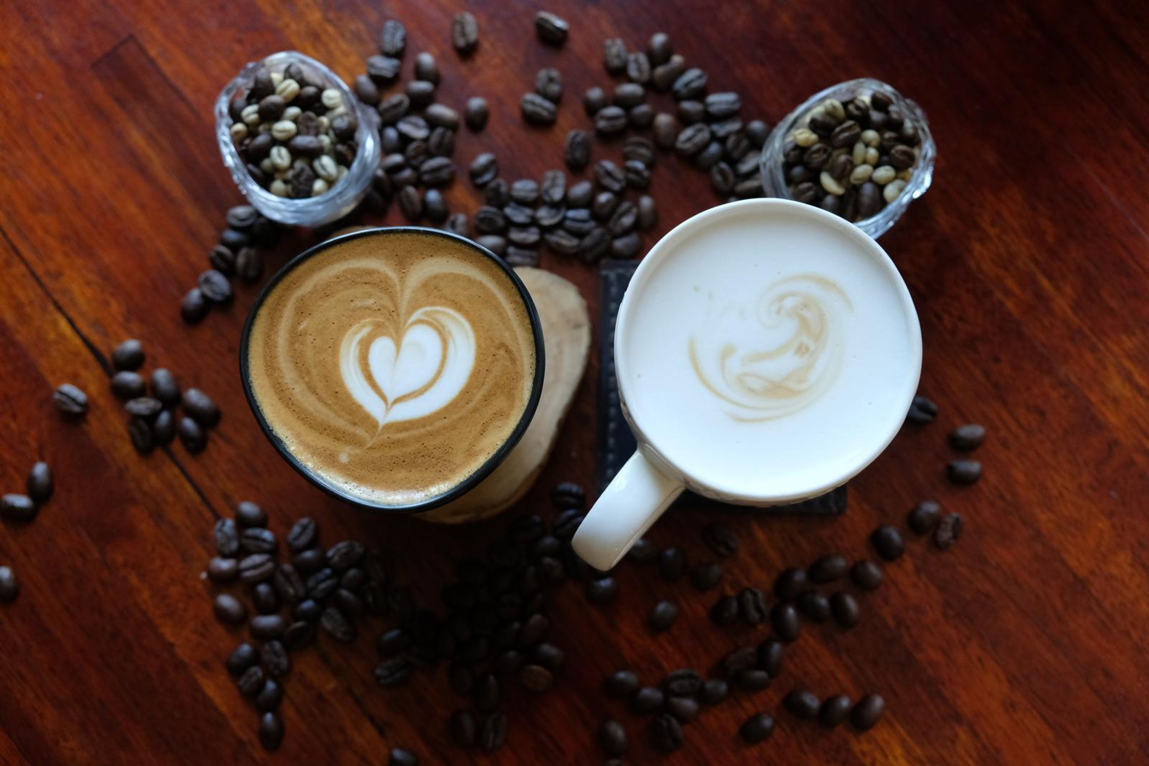 Death By Coffee creative product photography of coffee, beans and branded bags