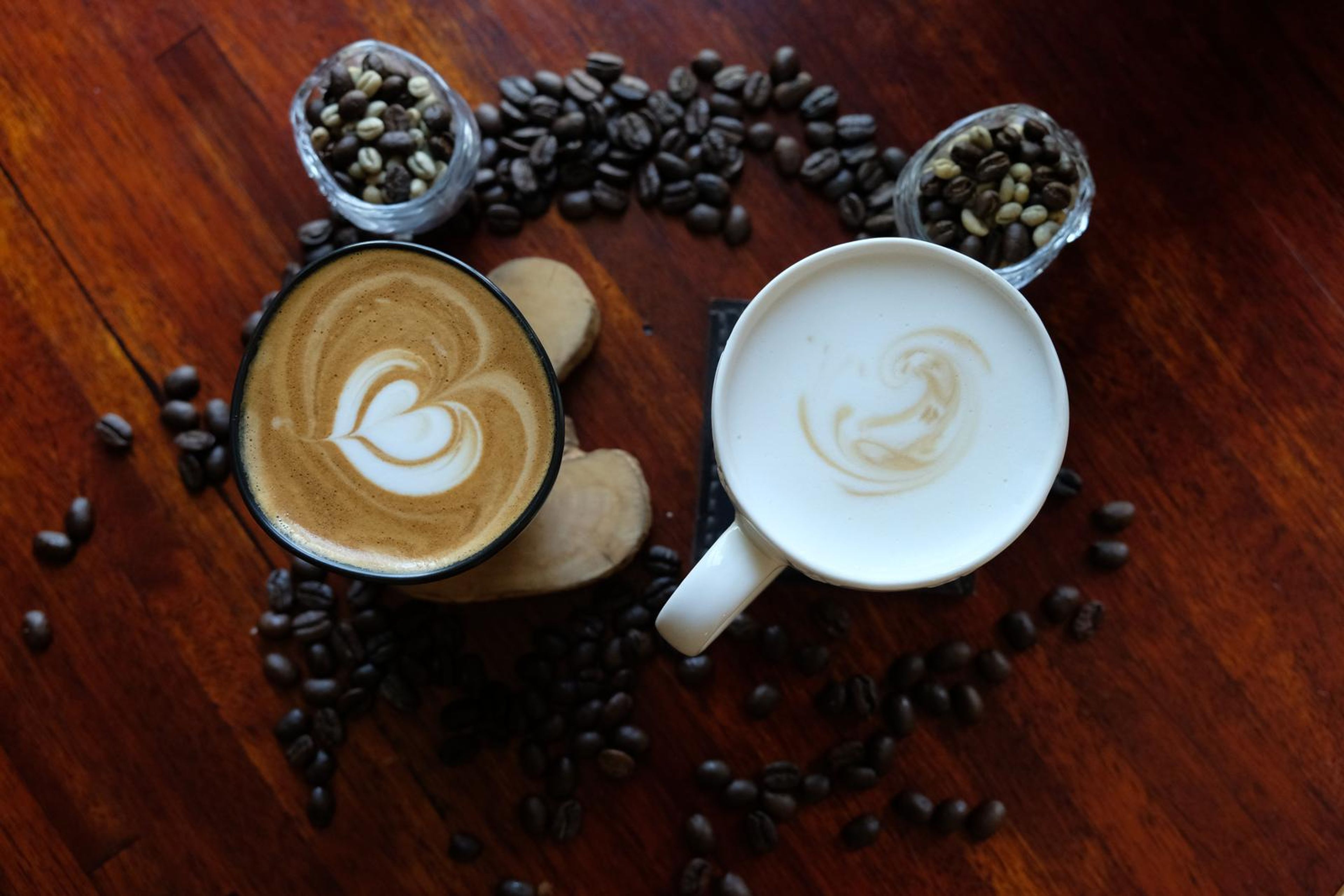 Death By Coffee creative product photography of coffee, beans and branded bags