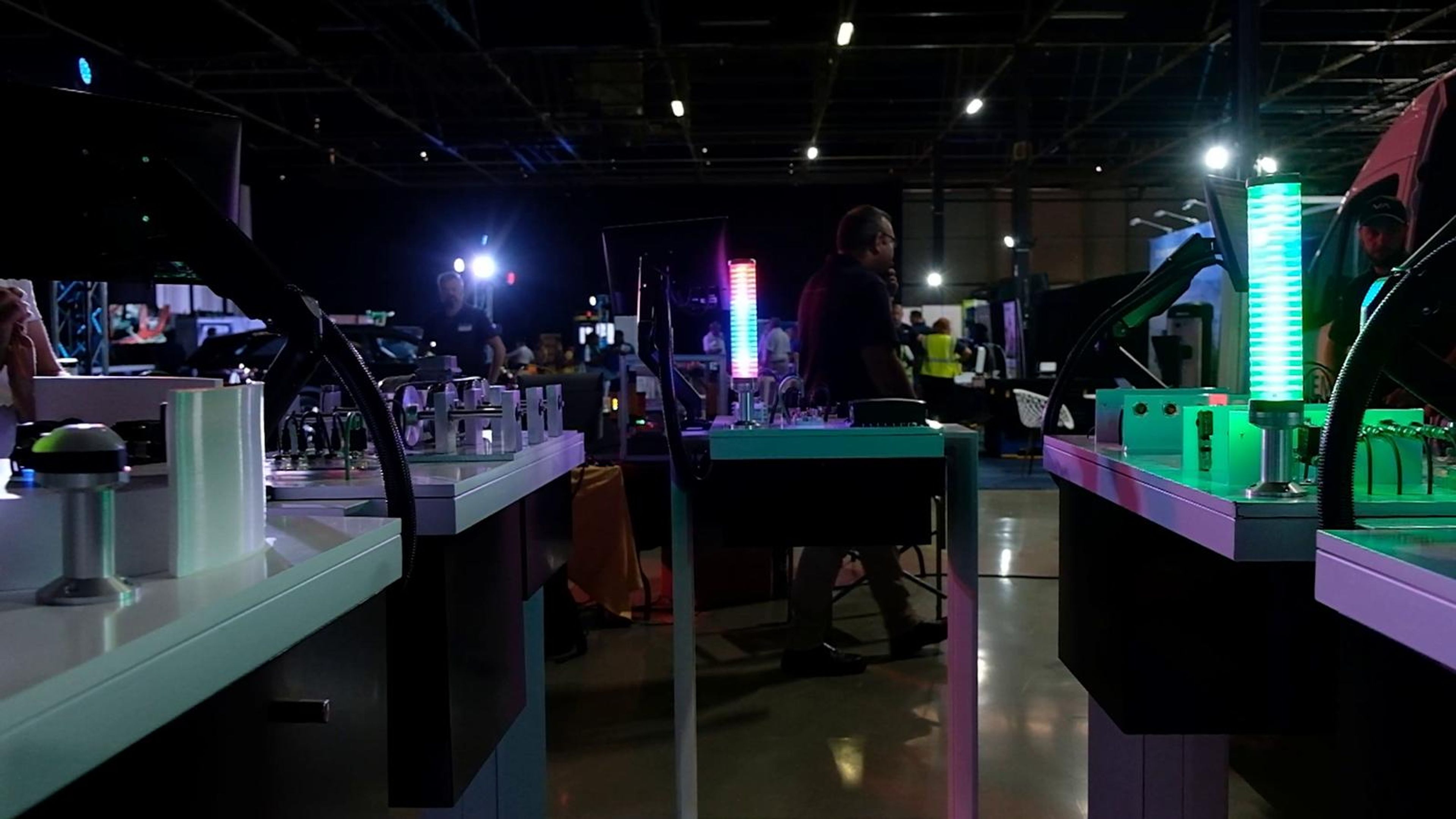 Glowing cables and a controller on a display table