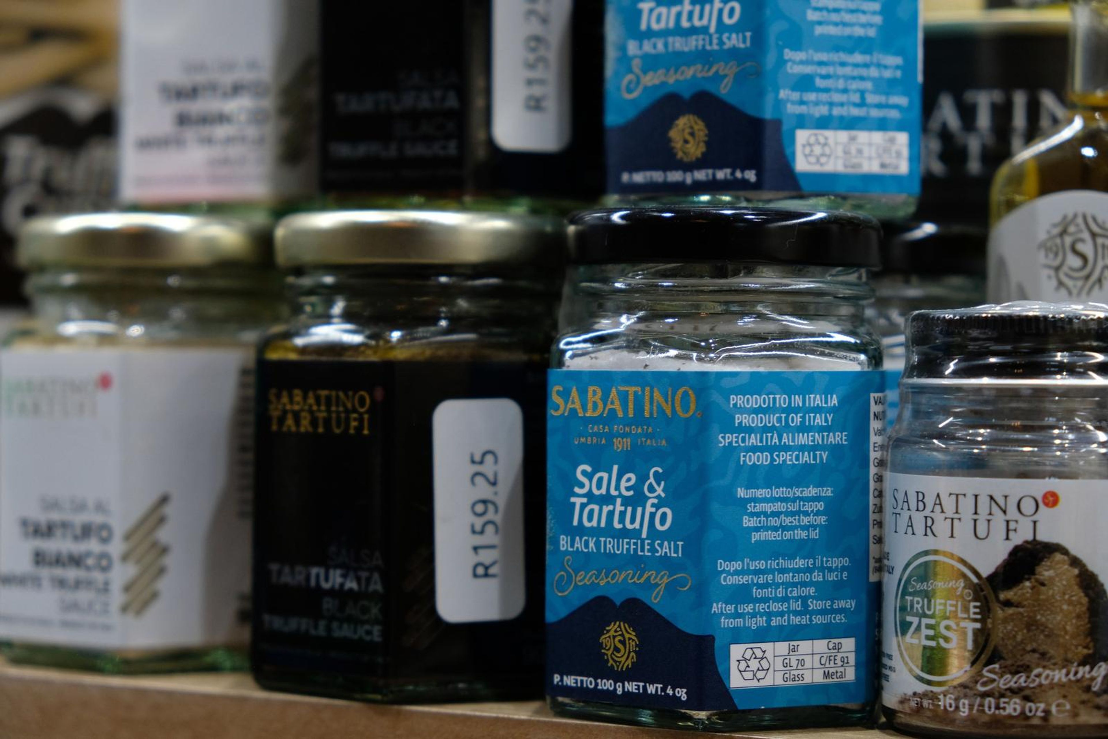 Jars of truffle sauces and salts on the shelf
