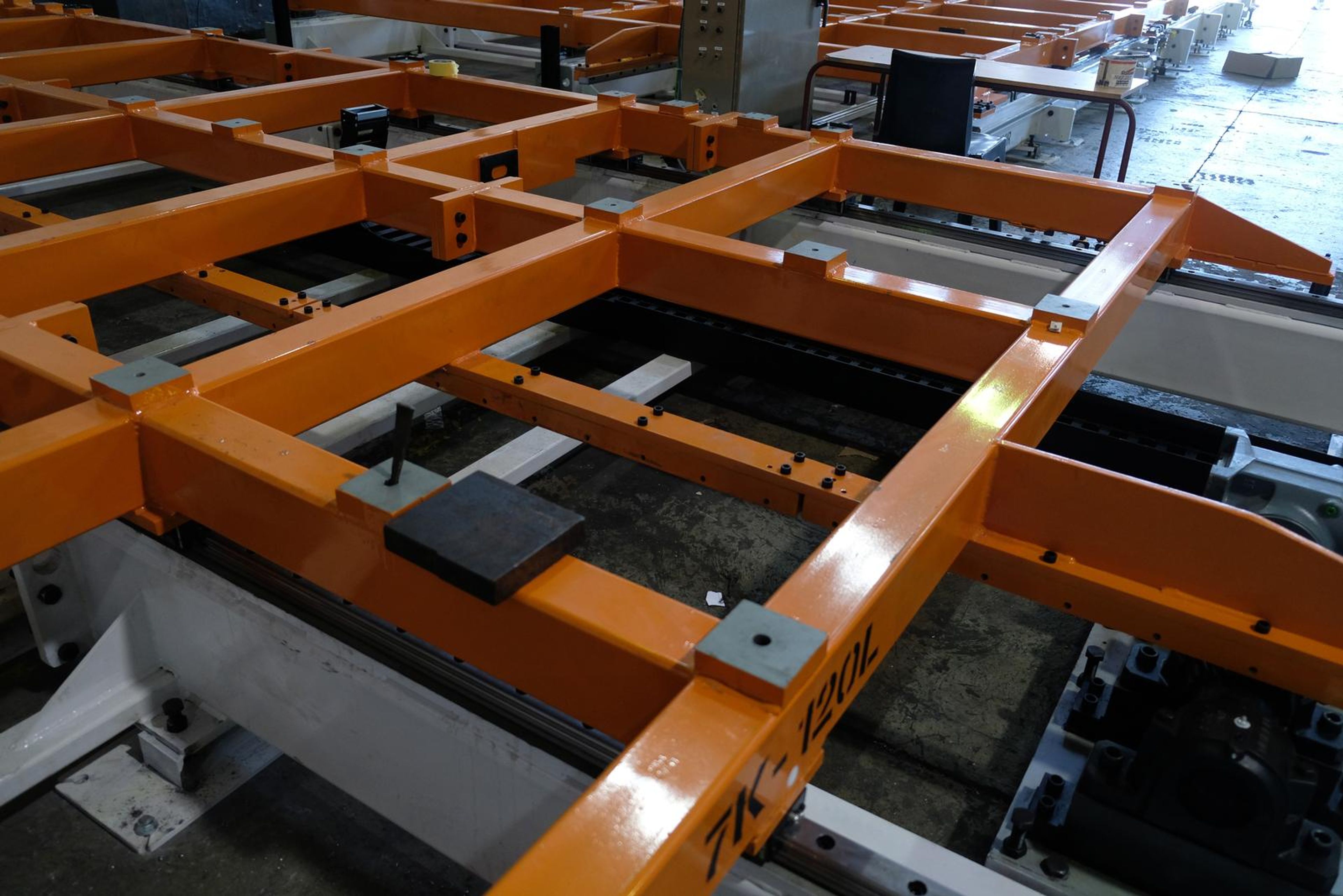Orange lattice frame seen from a low angle