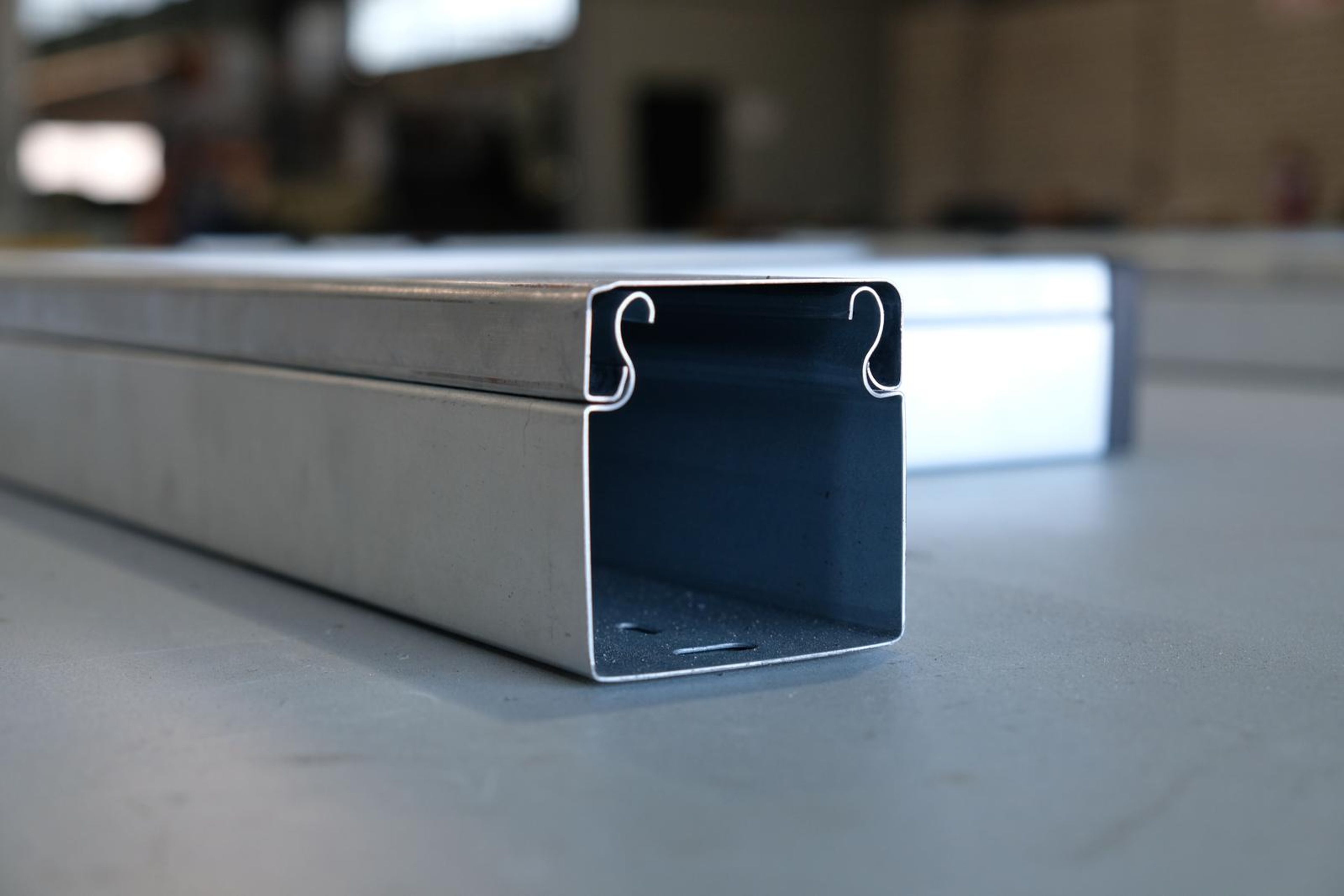 Close view of a grey steel box section end