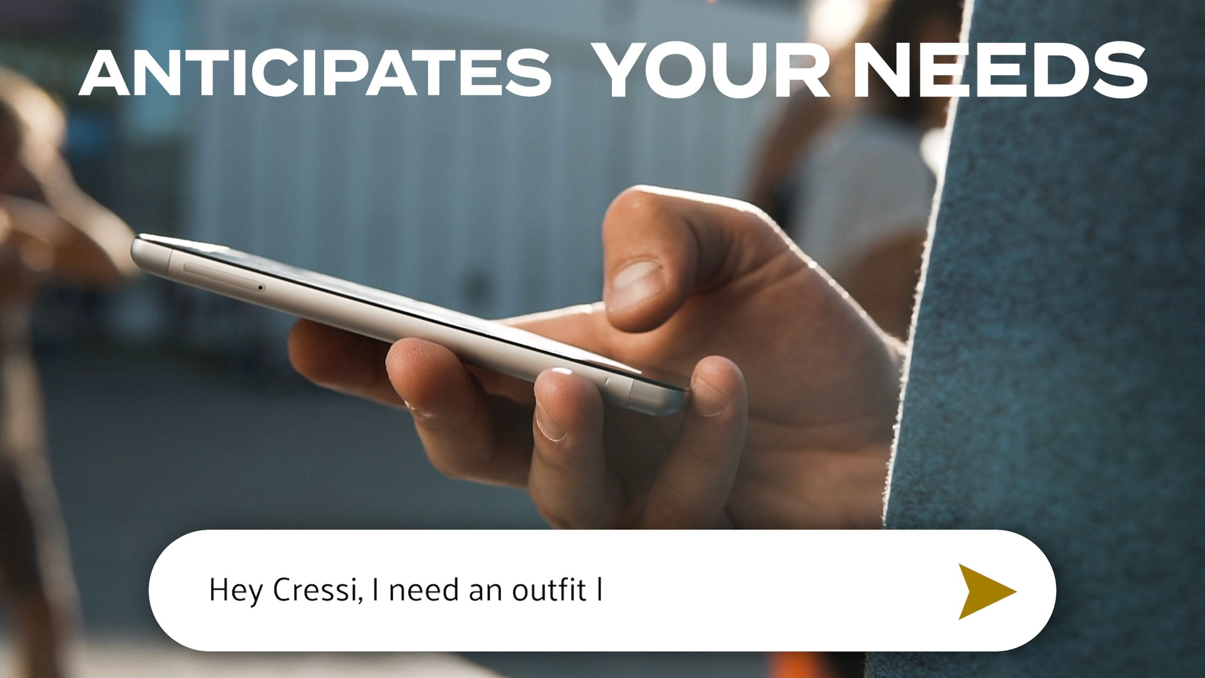 A hand holding a phone with the message 'Hey Cressi, I need an outfit!' under the text 'Anticipates your needs'