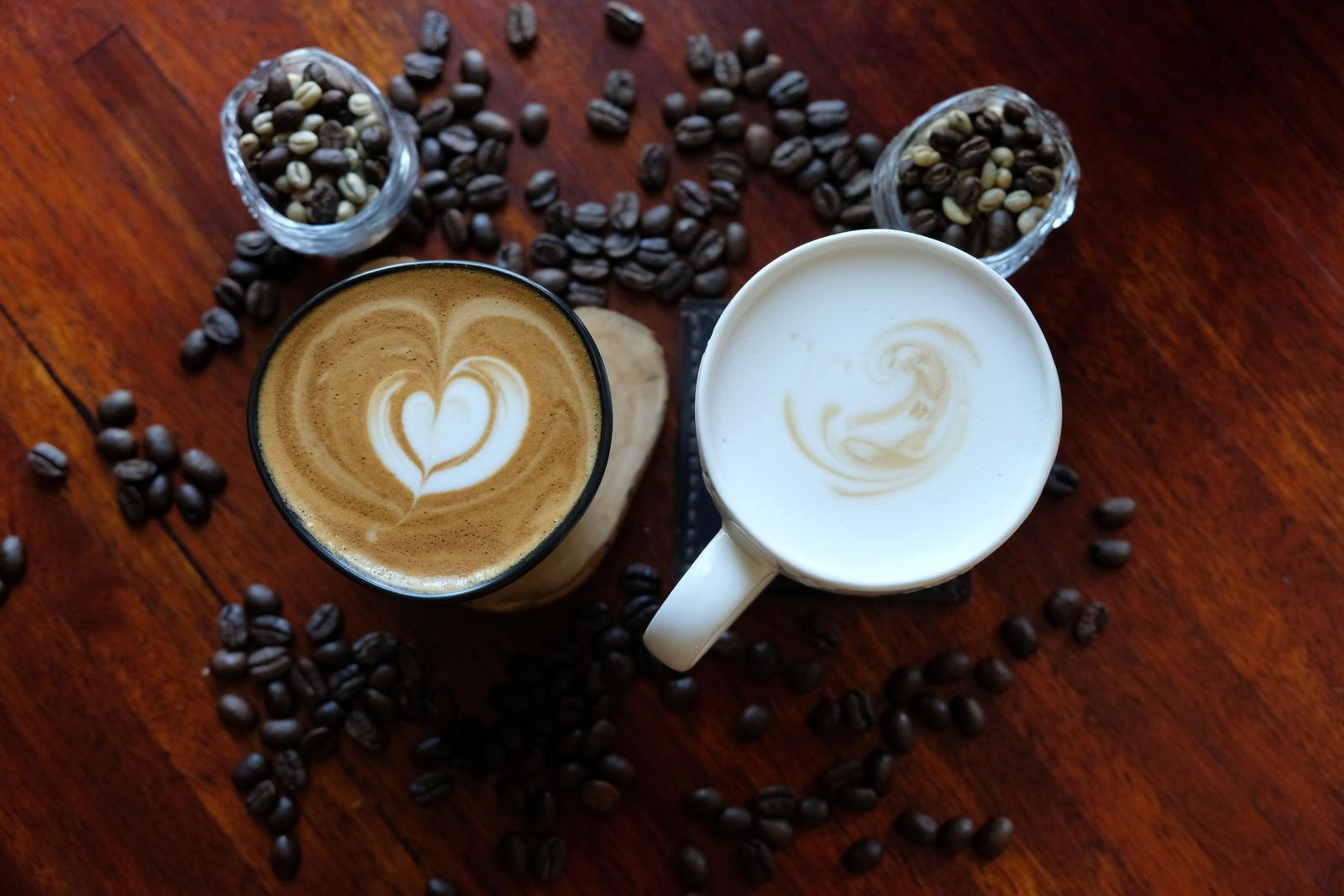 Death By Coffee creative product photography of coffee, beans and branded bags