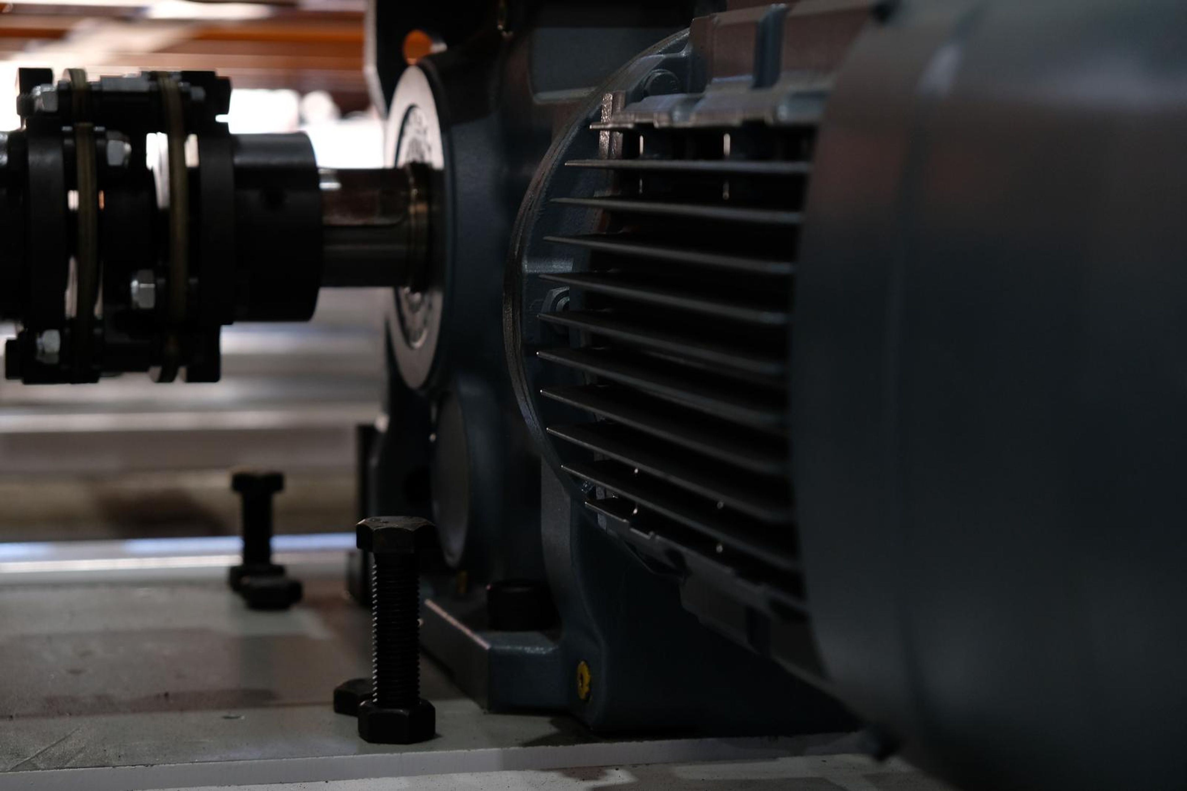 Drive shaft coupling beside a large electric motor