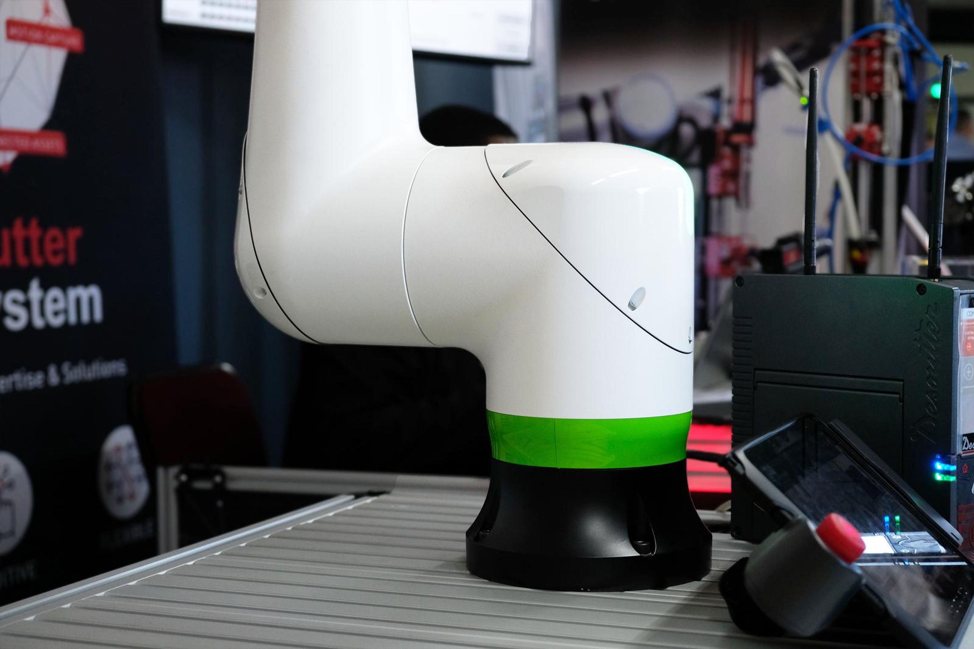 Base of a white Fanuc collaborative robot