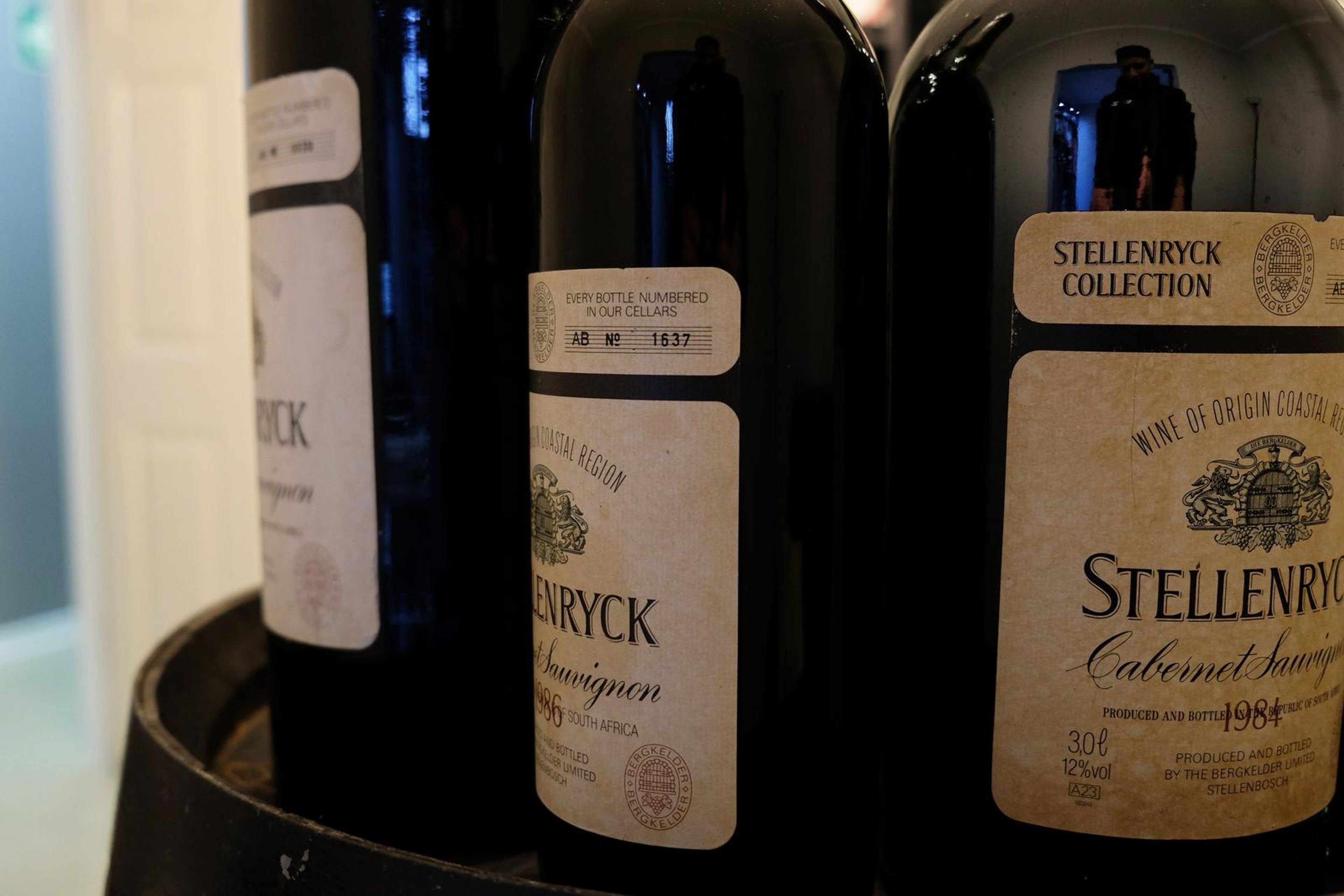 Close-up of vintage wine bottles with Stellenryck labels