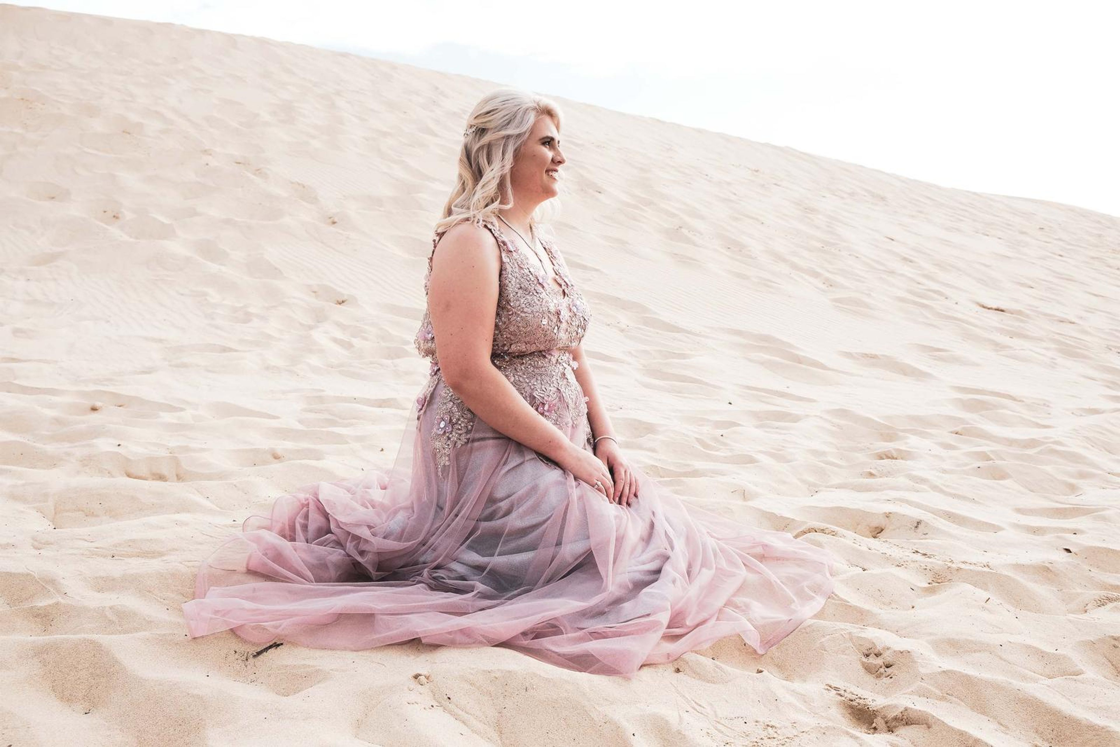 Sitting on the dune looking into the distance