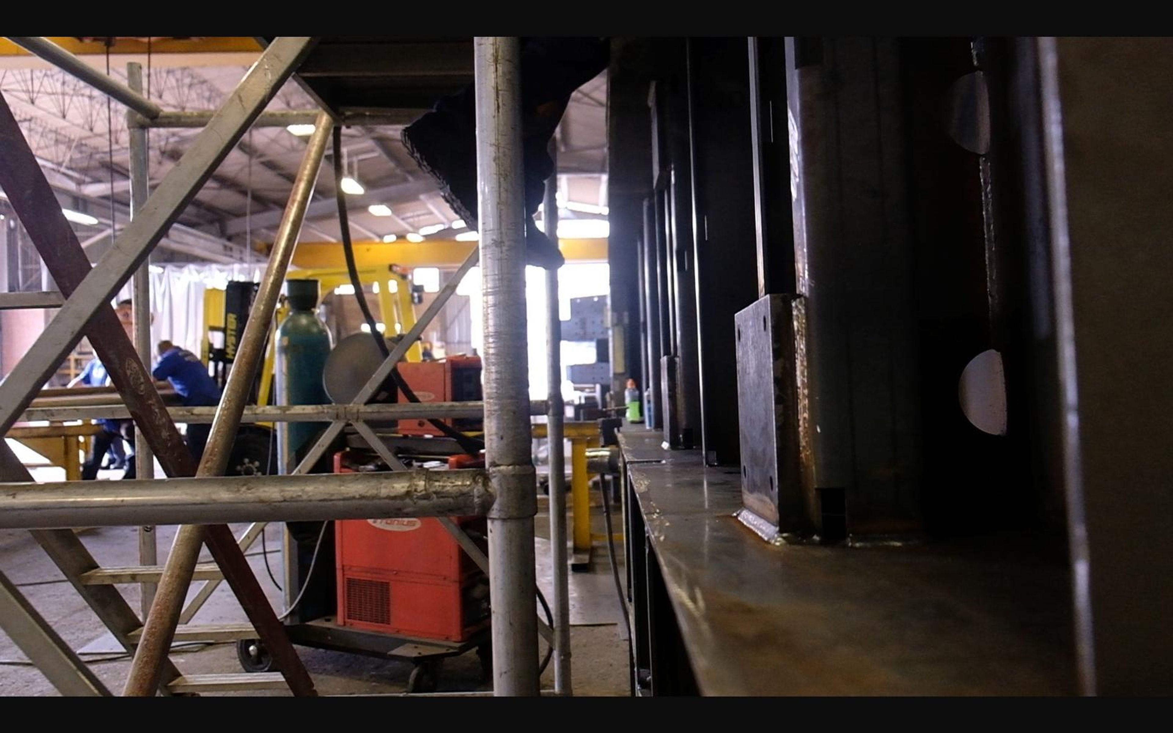 Scaffolding beside a steel structure