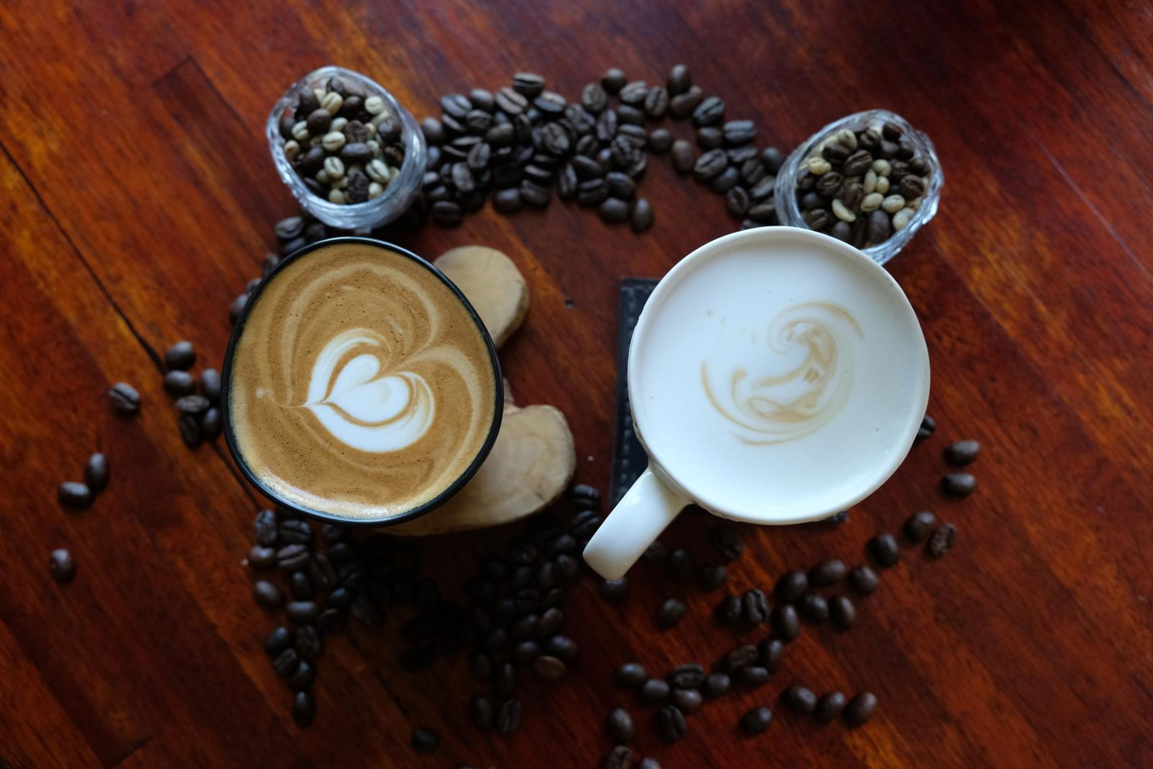 Death By Coffee creative product photography of coffee, beans and branded bags