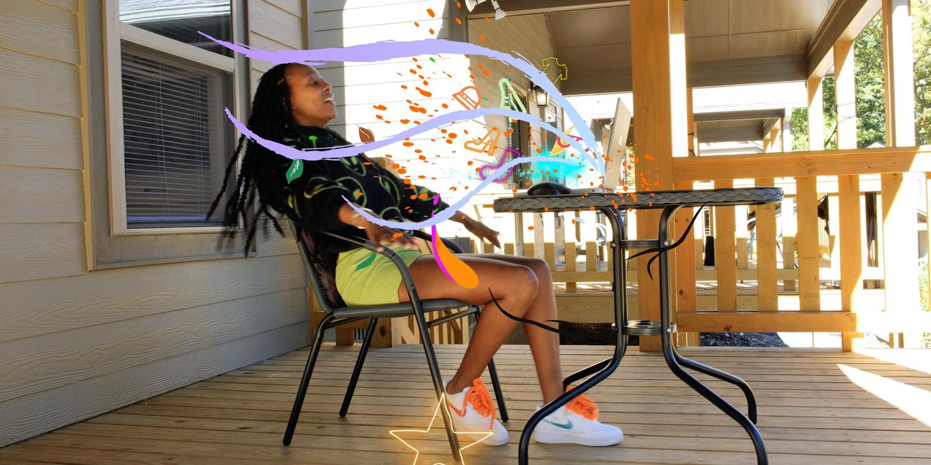 Frame with colourful animated graphics swirling around a woman searching on her laptop