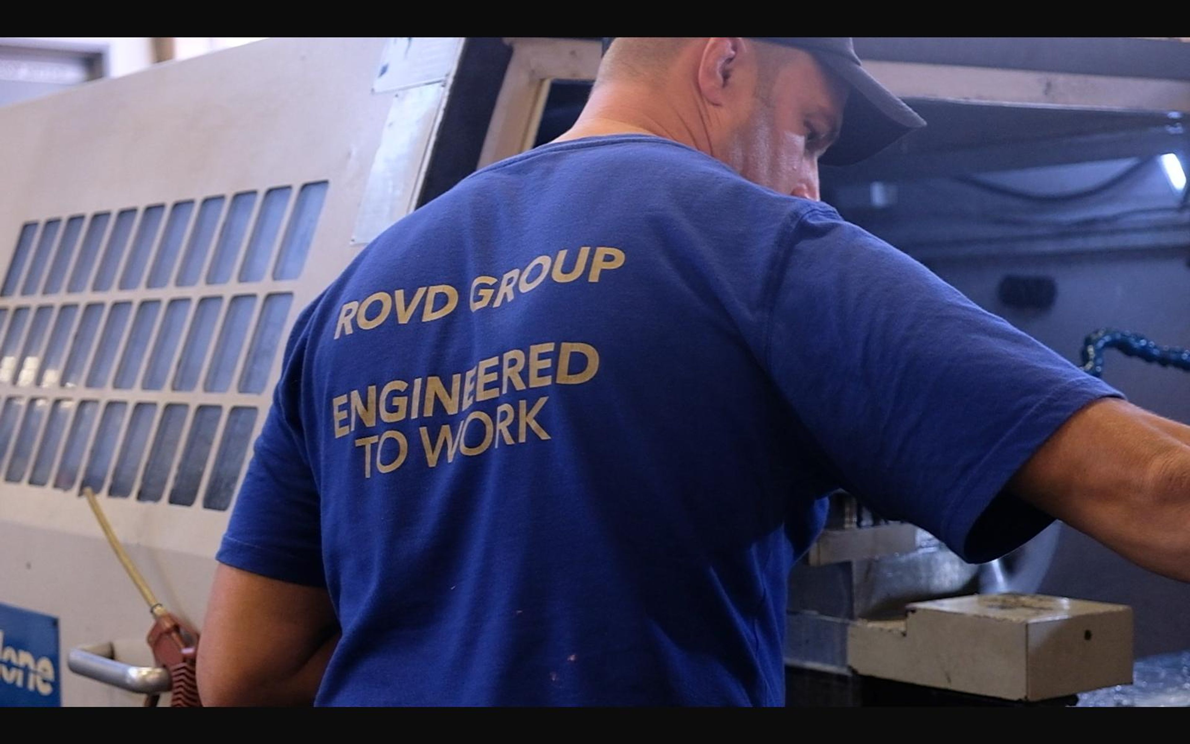 Machinist at a CNC lathe