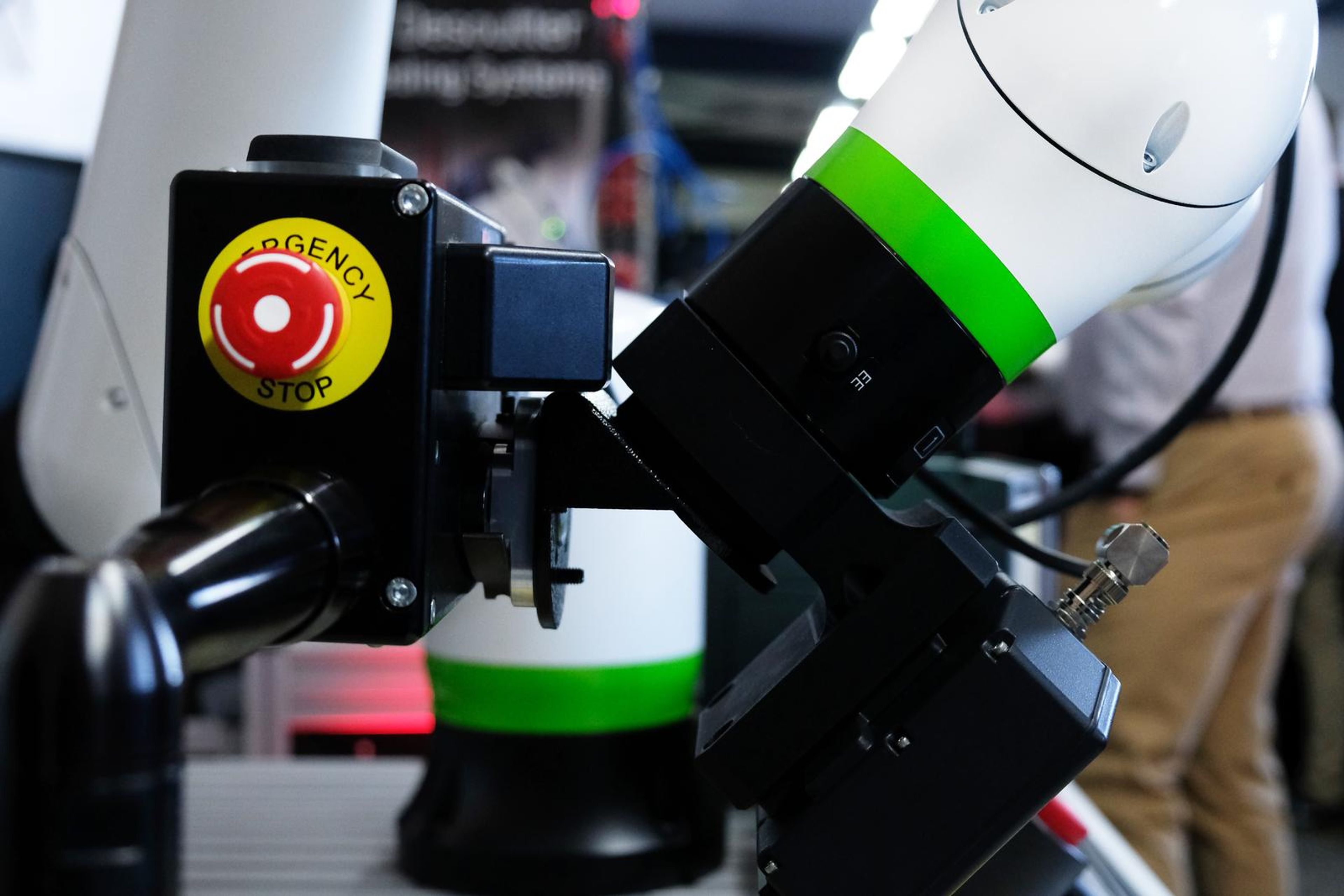 Fanuc collaborative robot wrist with its emergency stop button