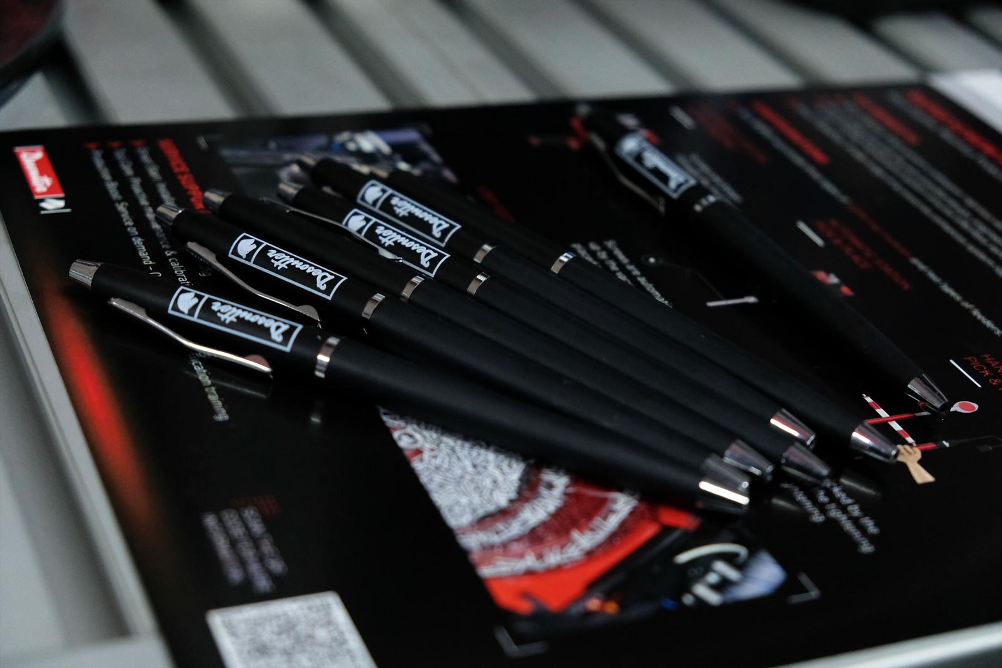 Desoutter tools laid out on a black display