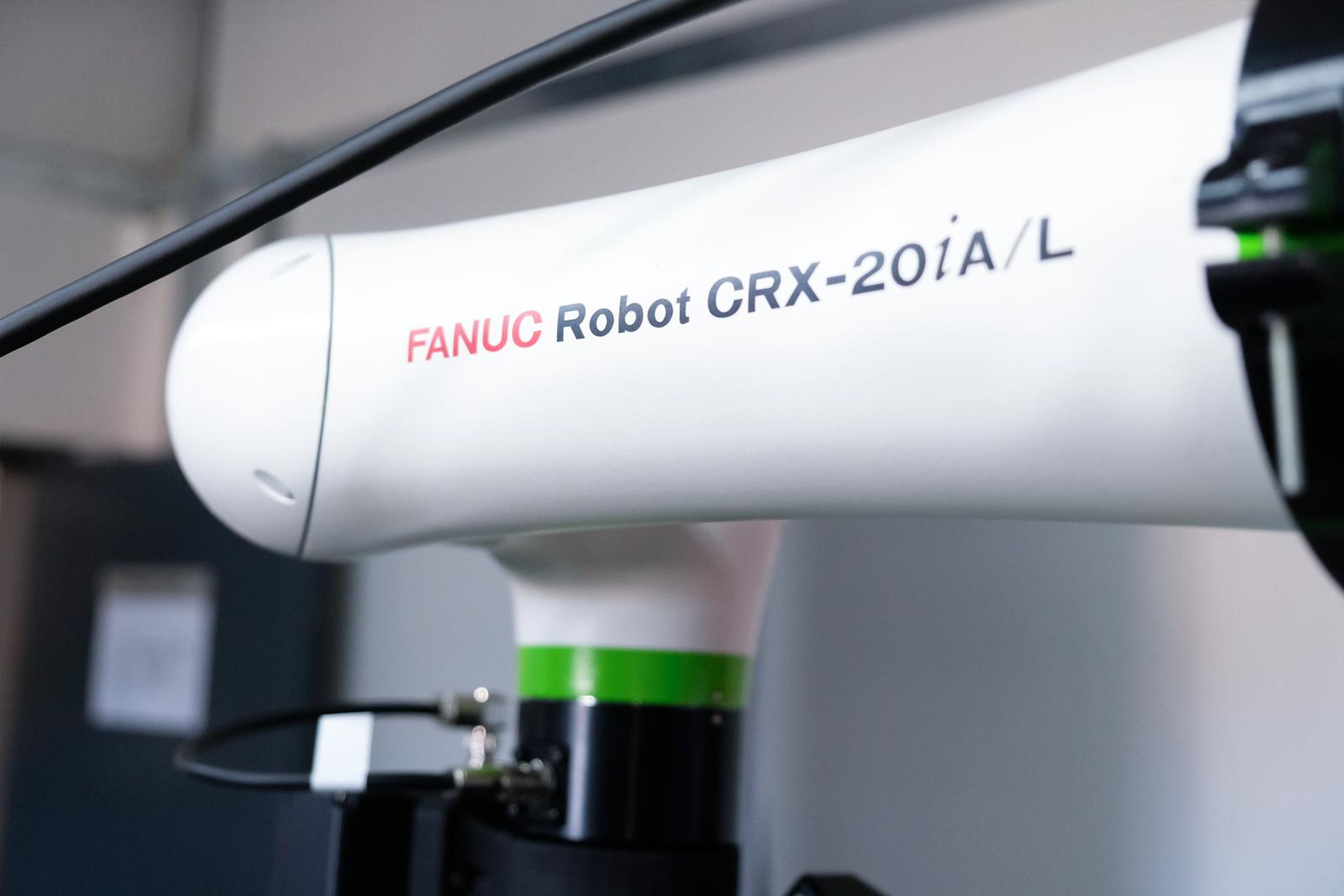Close view of a Fanuc CRX-20iA/L collaborative robot arm