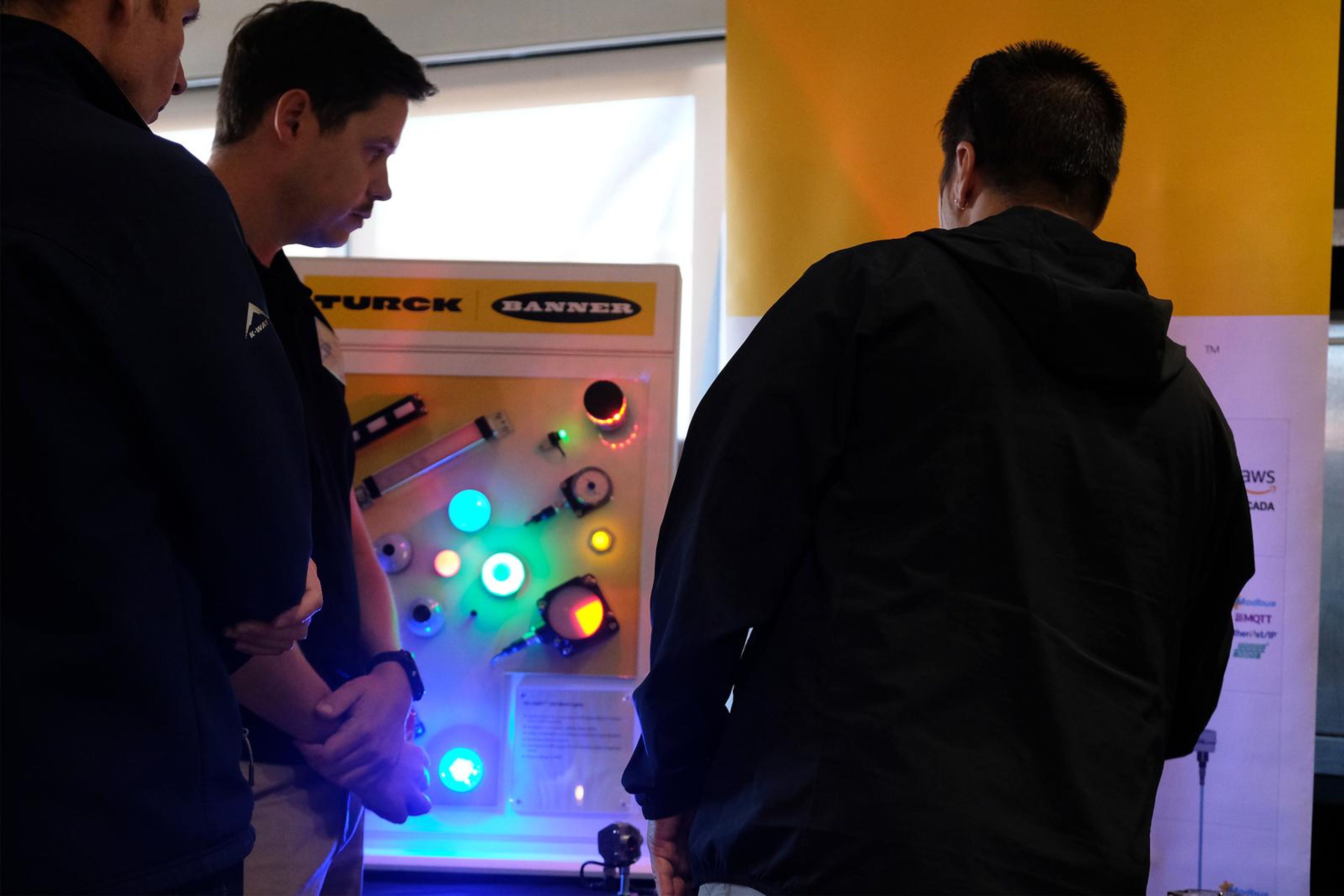 Visitors at the Turck light panel