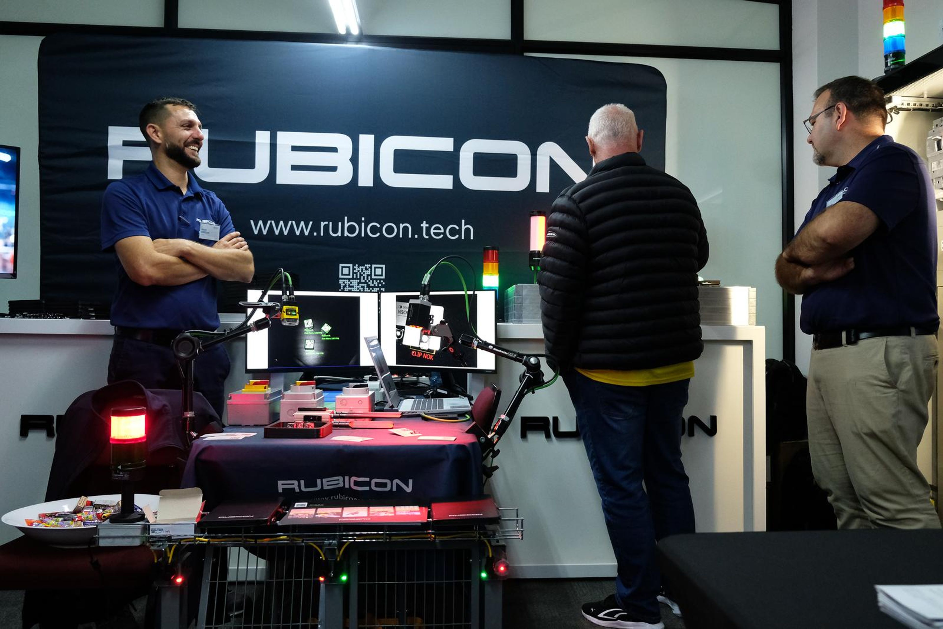 Rubicon staff behind the demonstration desk