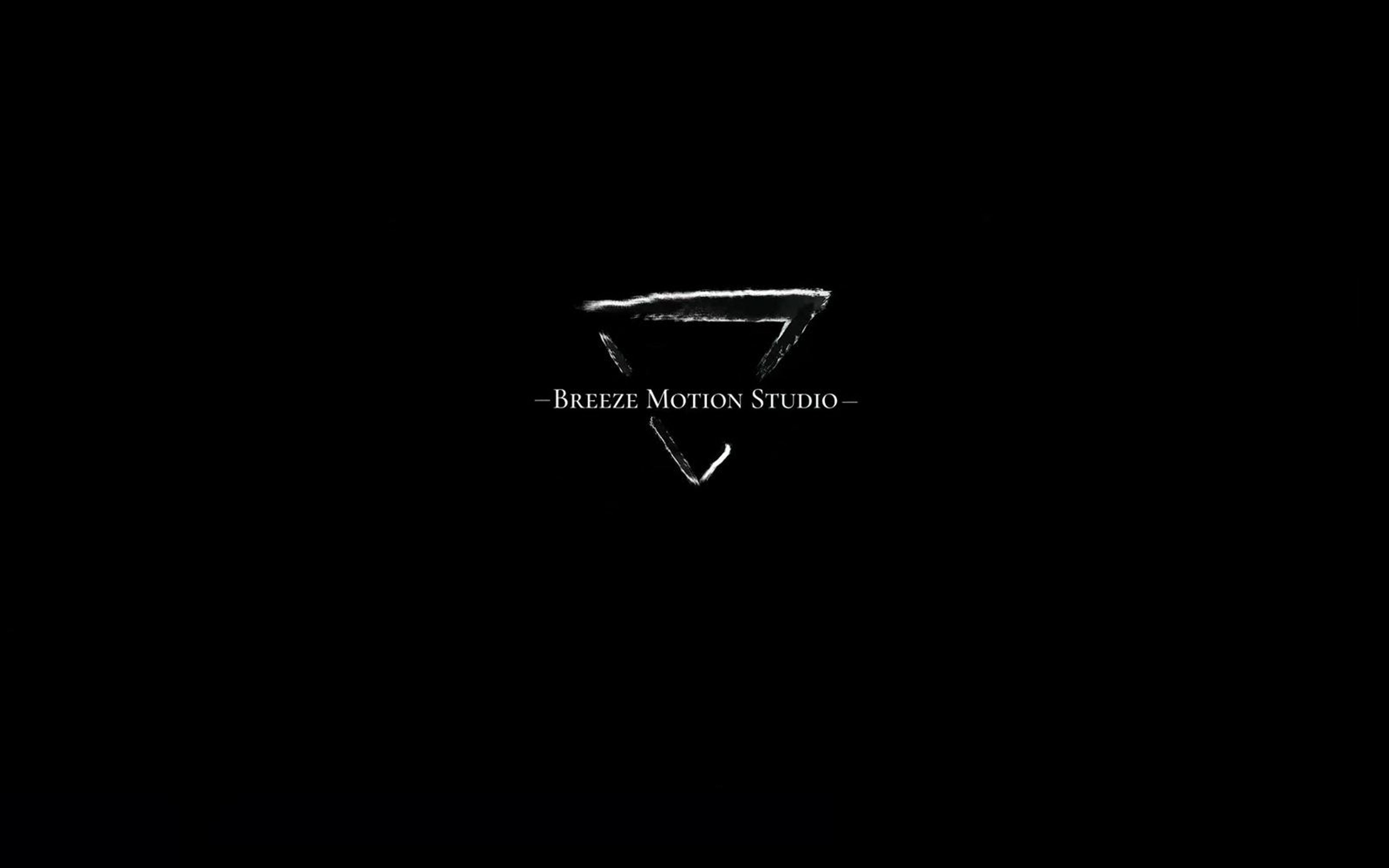 Breeze Motion Studio triangle logo glowing white on a black screen