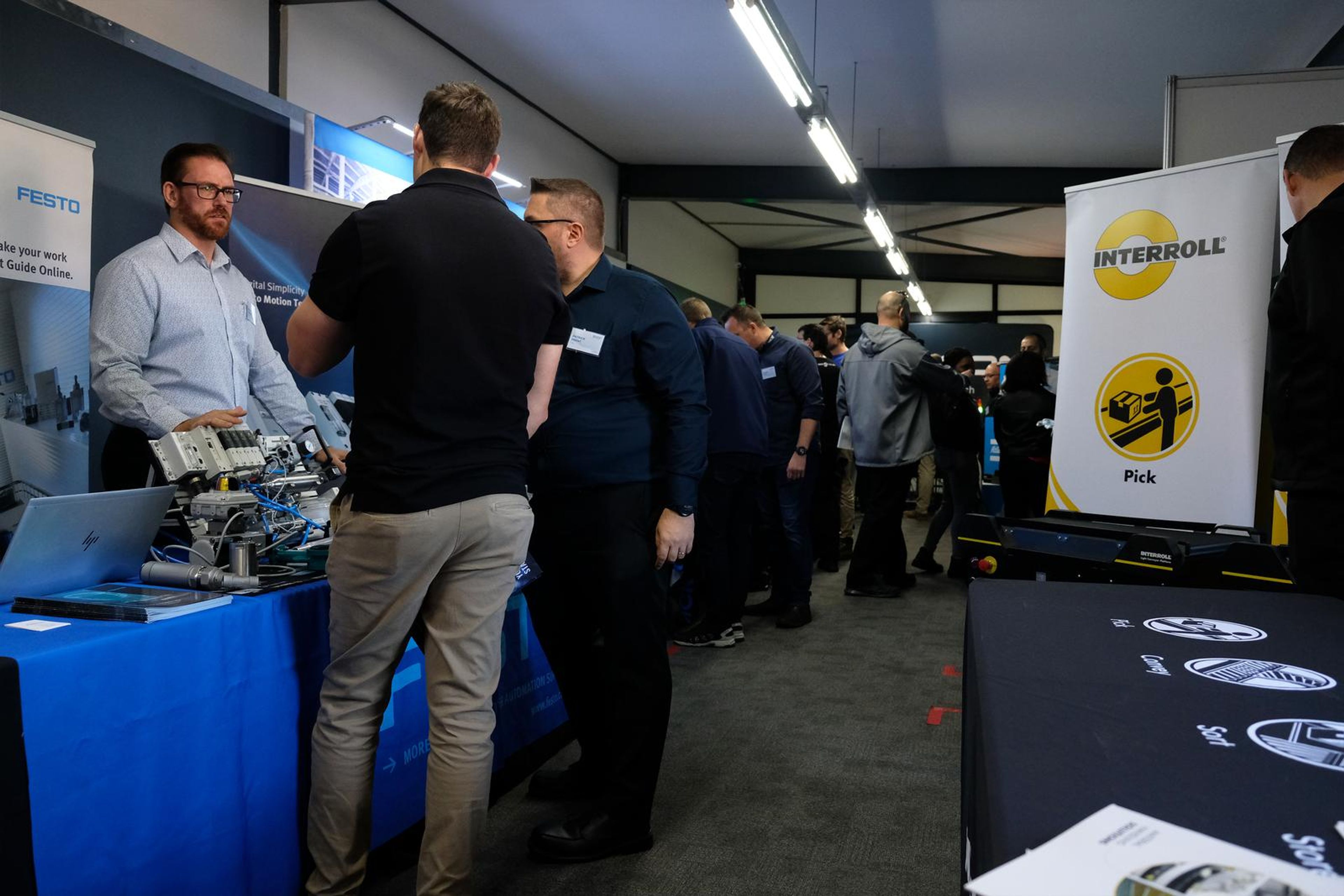 Festo stand with presenters and visitors