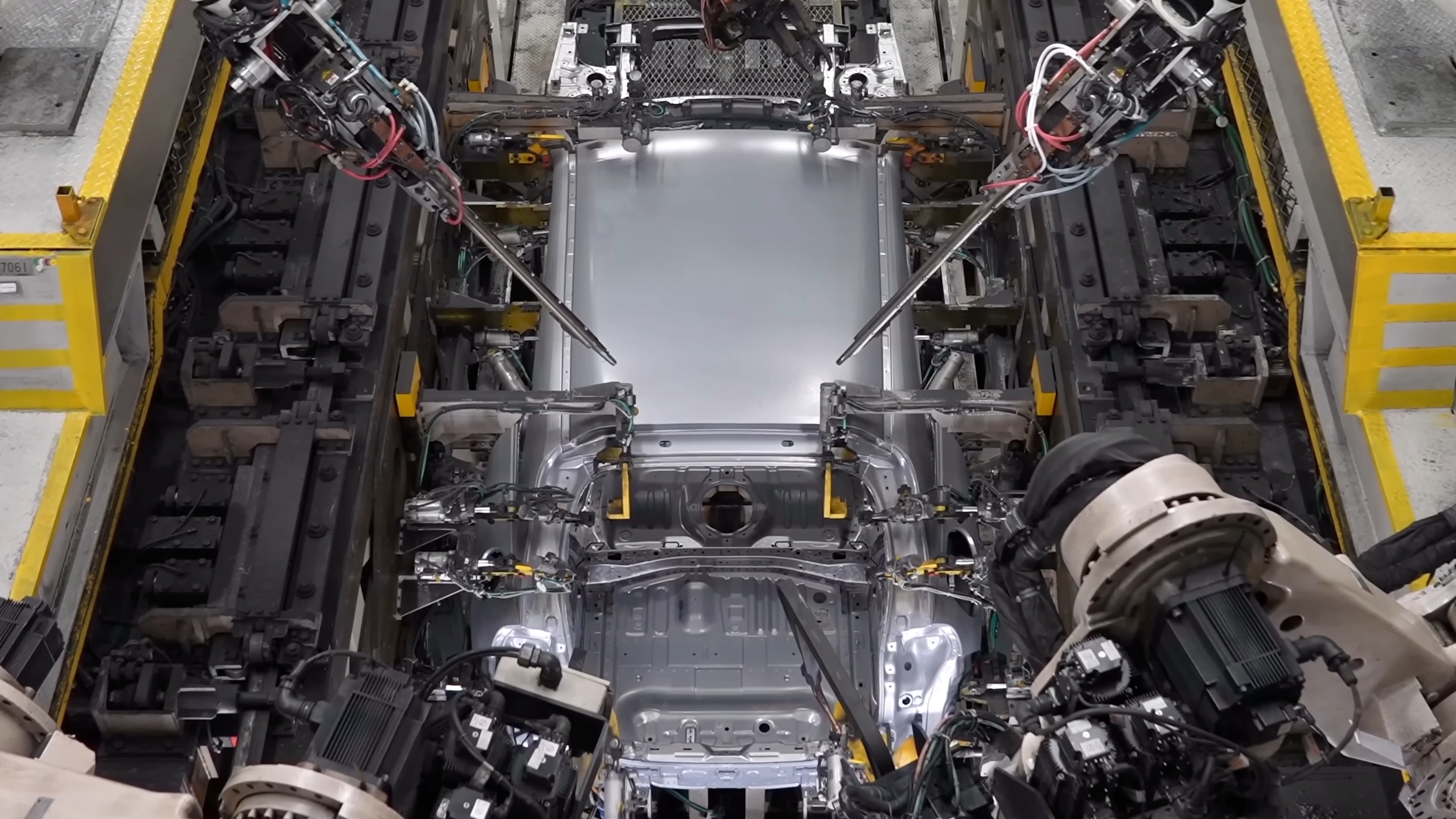 Overhead view of a vehicle chassis on an assembly line